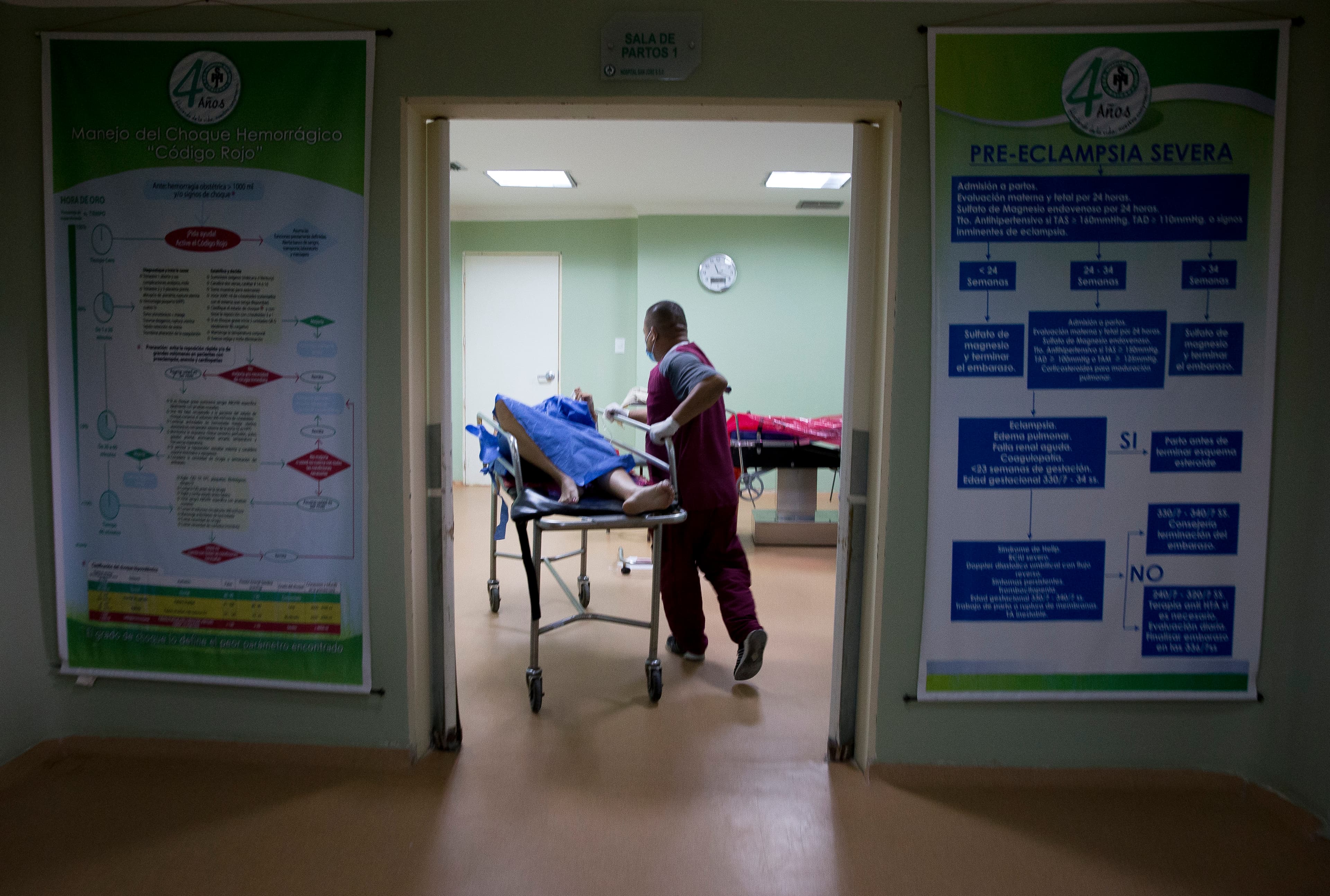 womam being wheeled into an ER