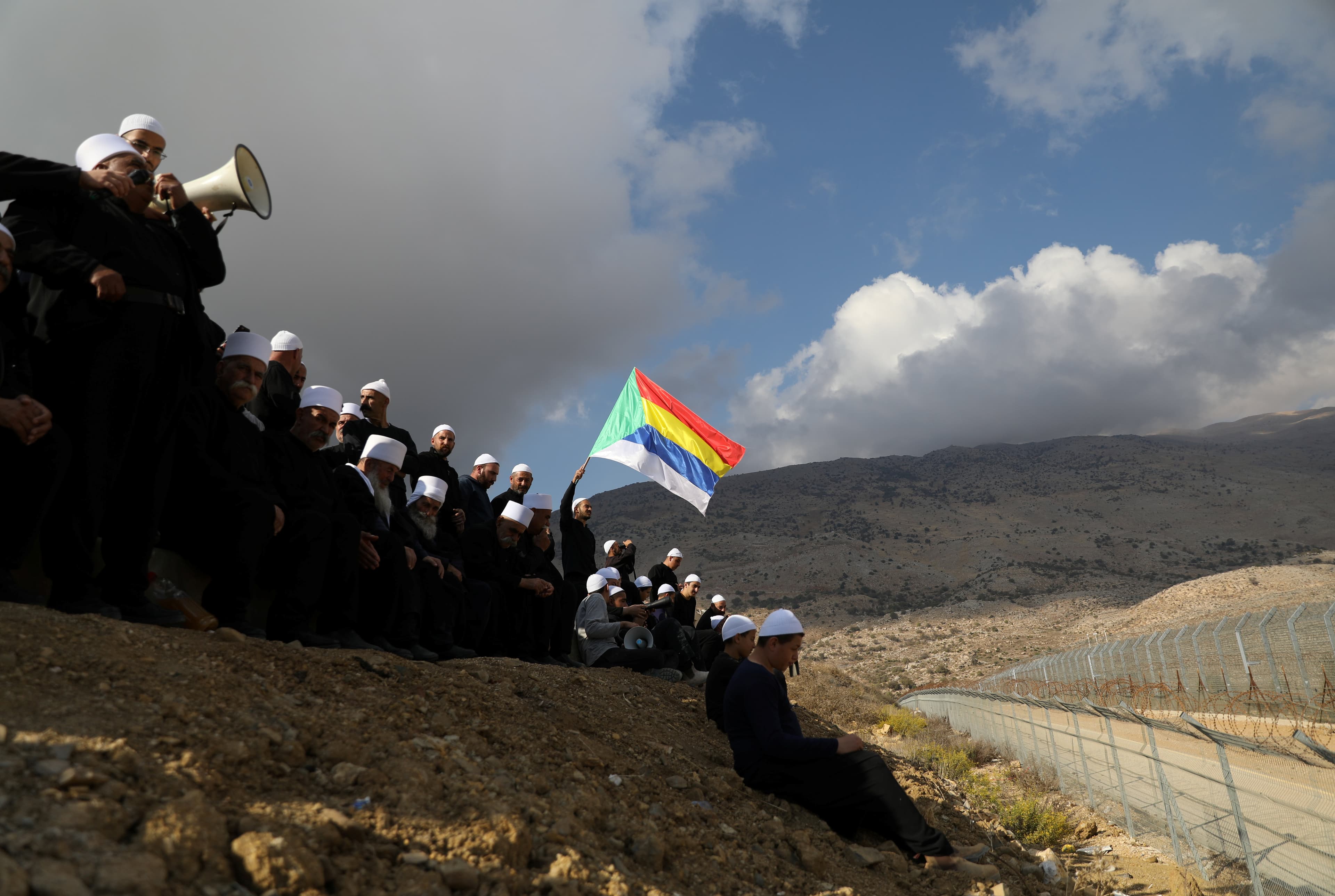 Druze  in the Golan Heights gather to contact their relatives across the border in Syria, Nov. 4, 2017.