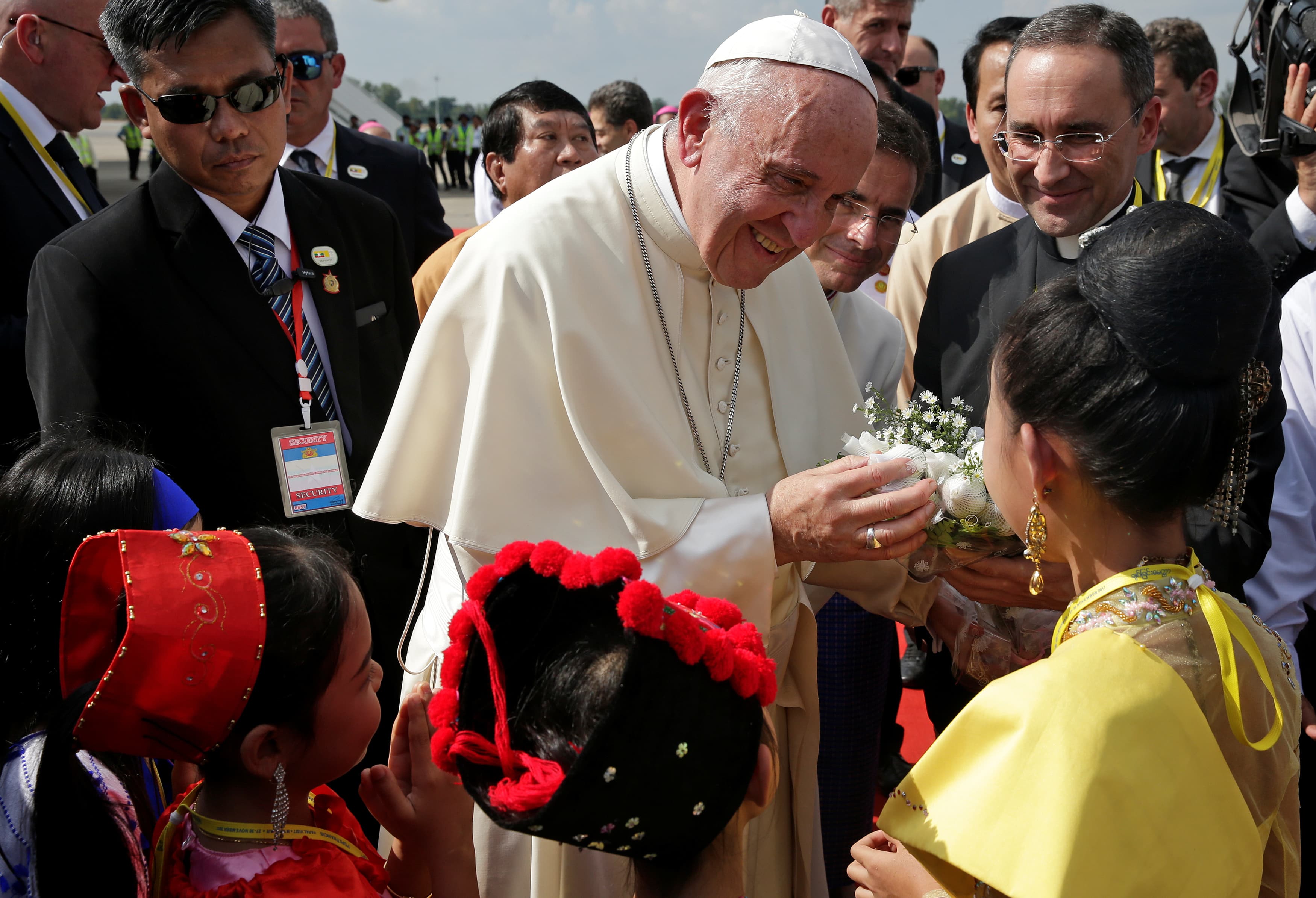 Pope Francis is welcomed as he arrives at Yangon International Airport, Myanmar November 27, 2017.