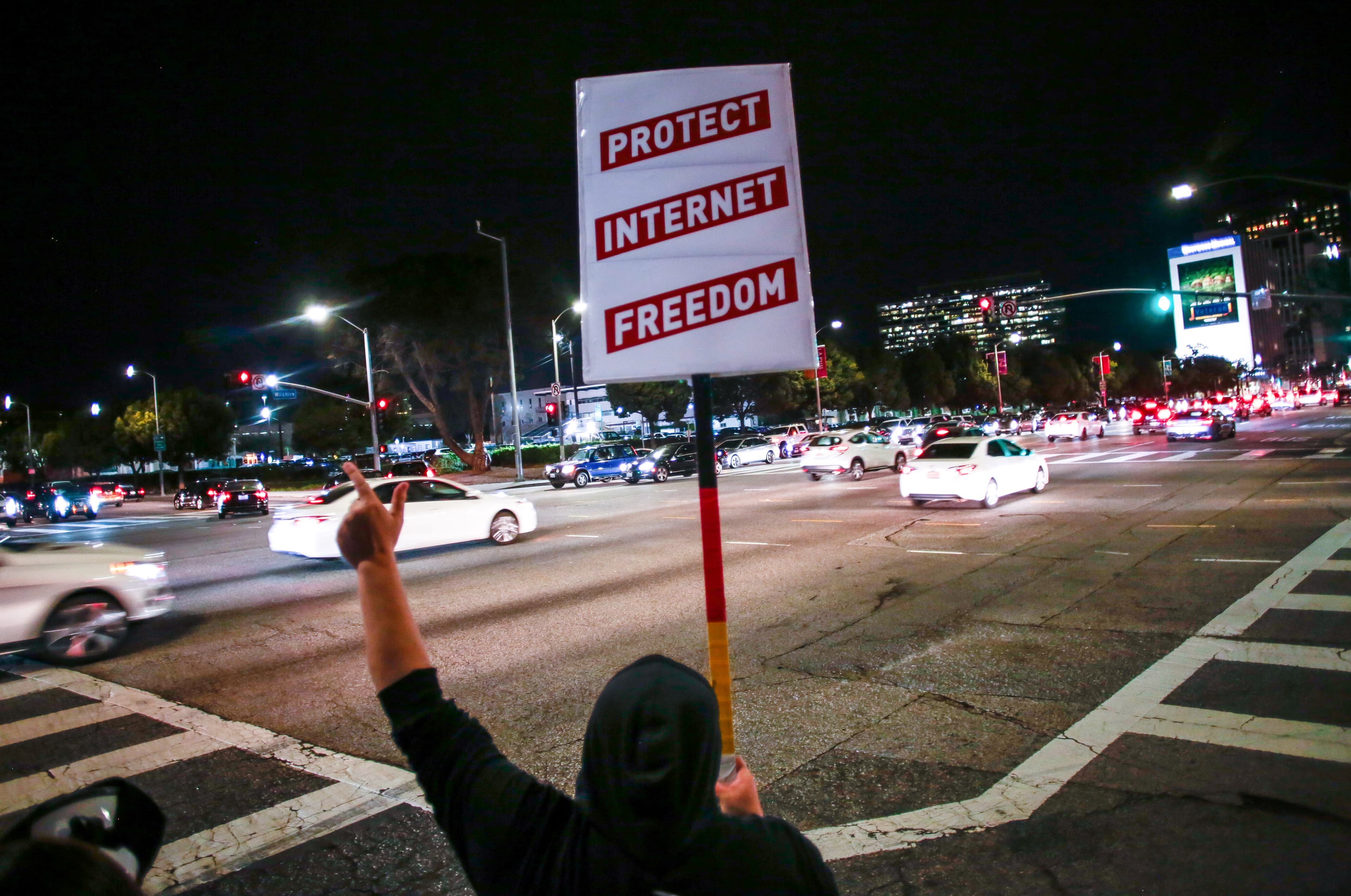 Supporter of Net Neutrality Lance Brown Eyes protests the FCC's recent decision to repeal the program in Los Angeles, California, November 28, 2017.