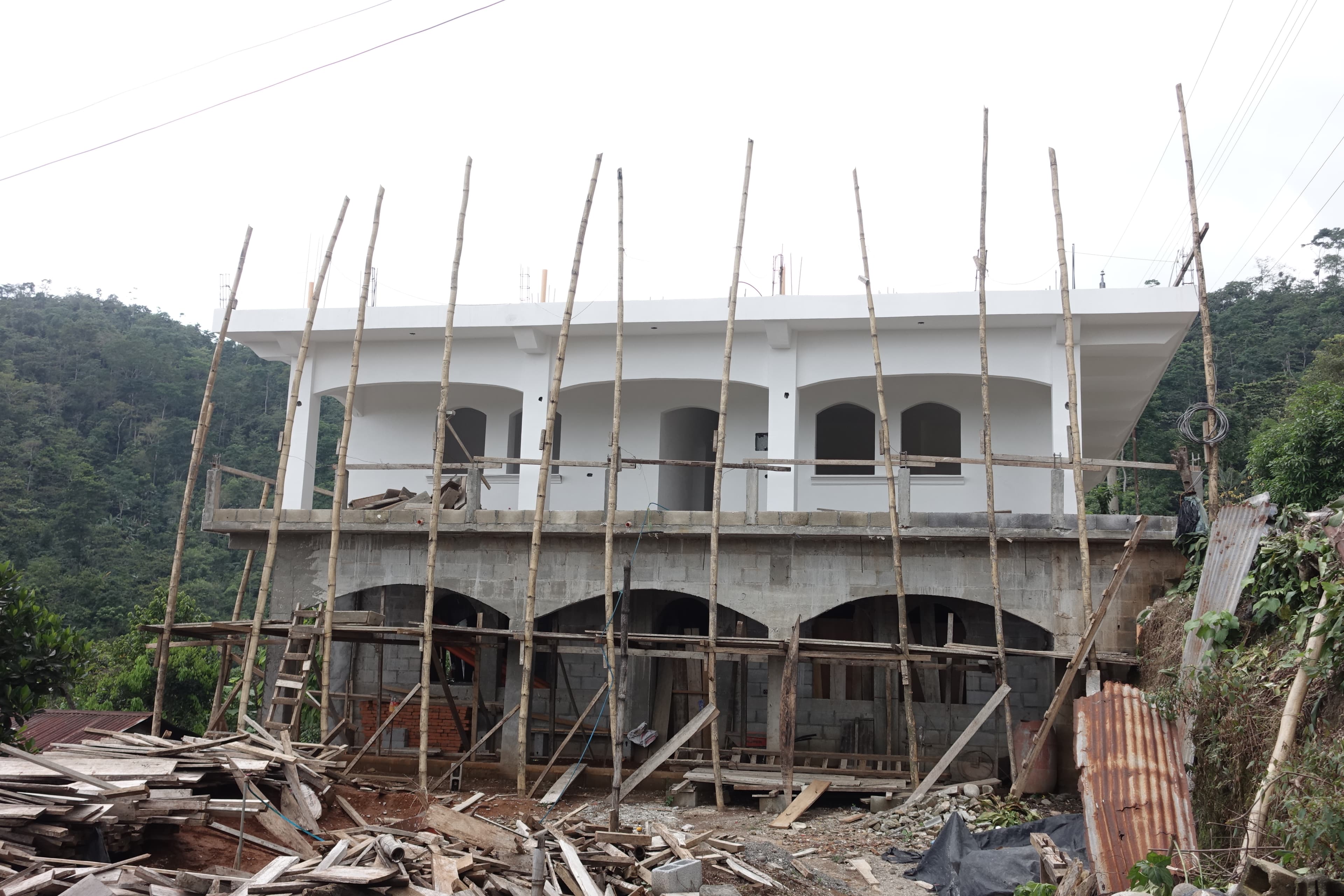 New houses under construction in the village of Comunidad Agraria Emanuel, a coffee-growing region in western Guatemala.