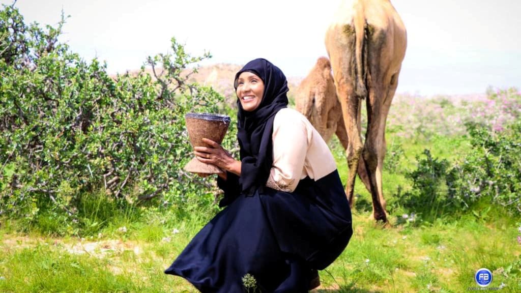 A woman poses for a photo