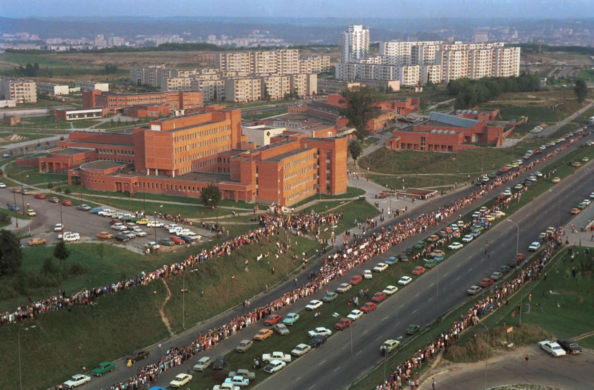 Lithuanians hold hands in a 