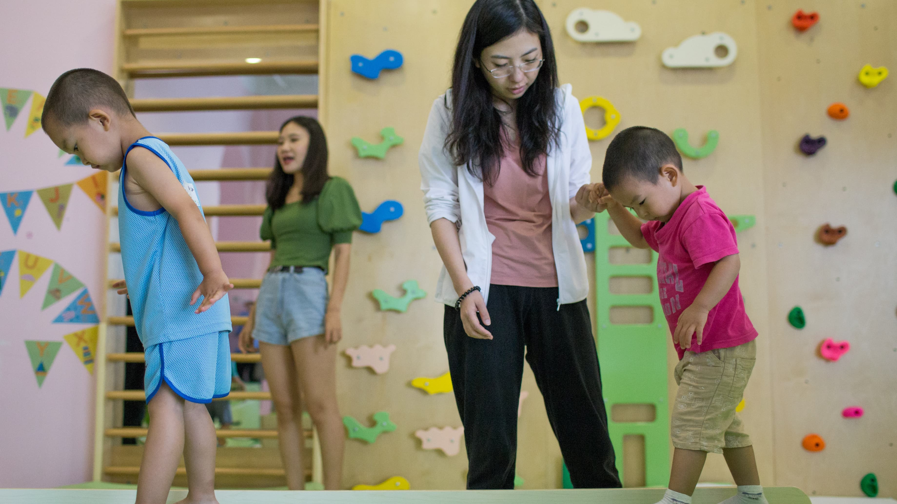 Mother plays with toddler