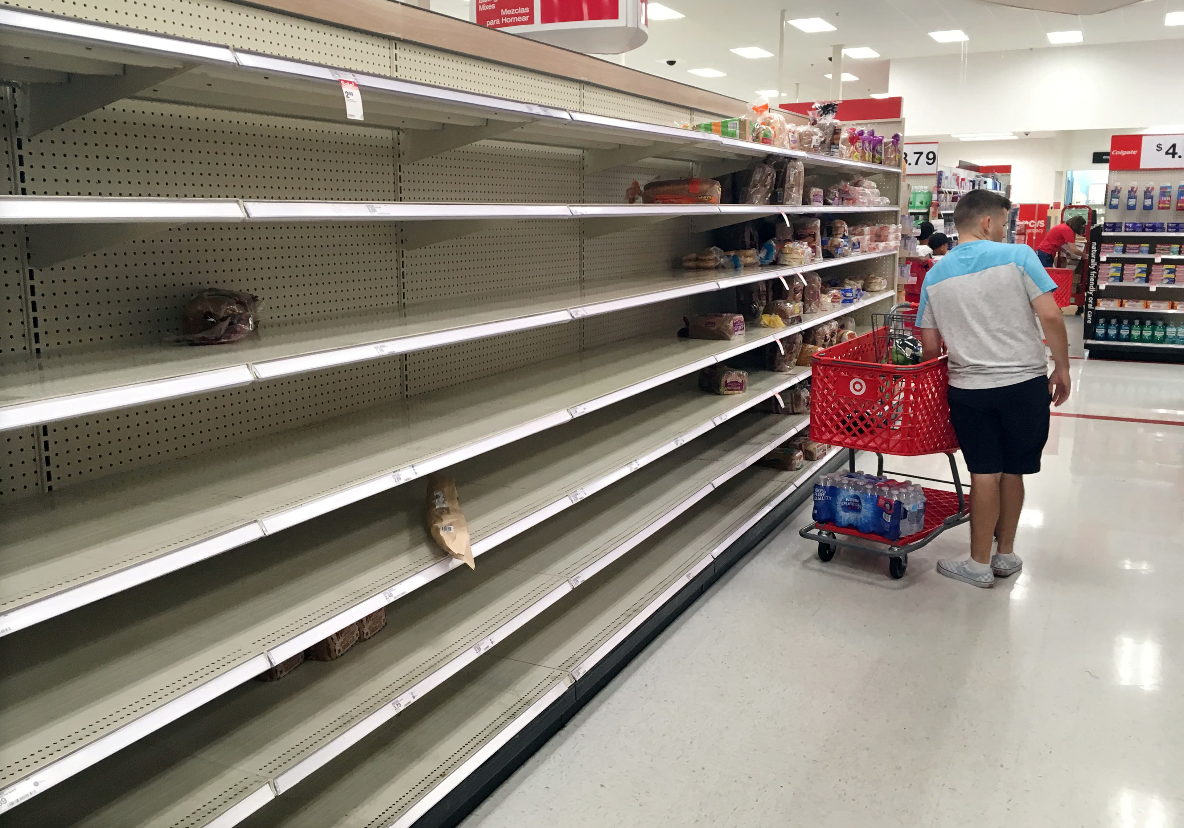 An empty shelf in a grocery store.