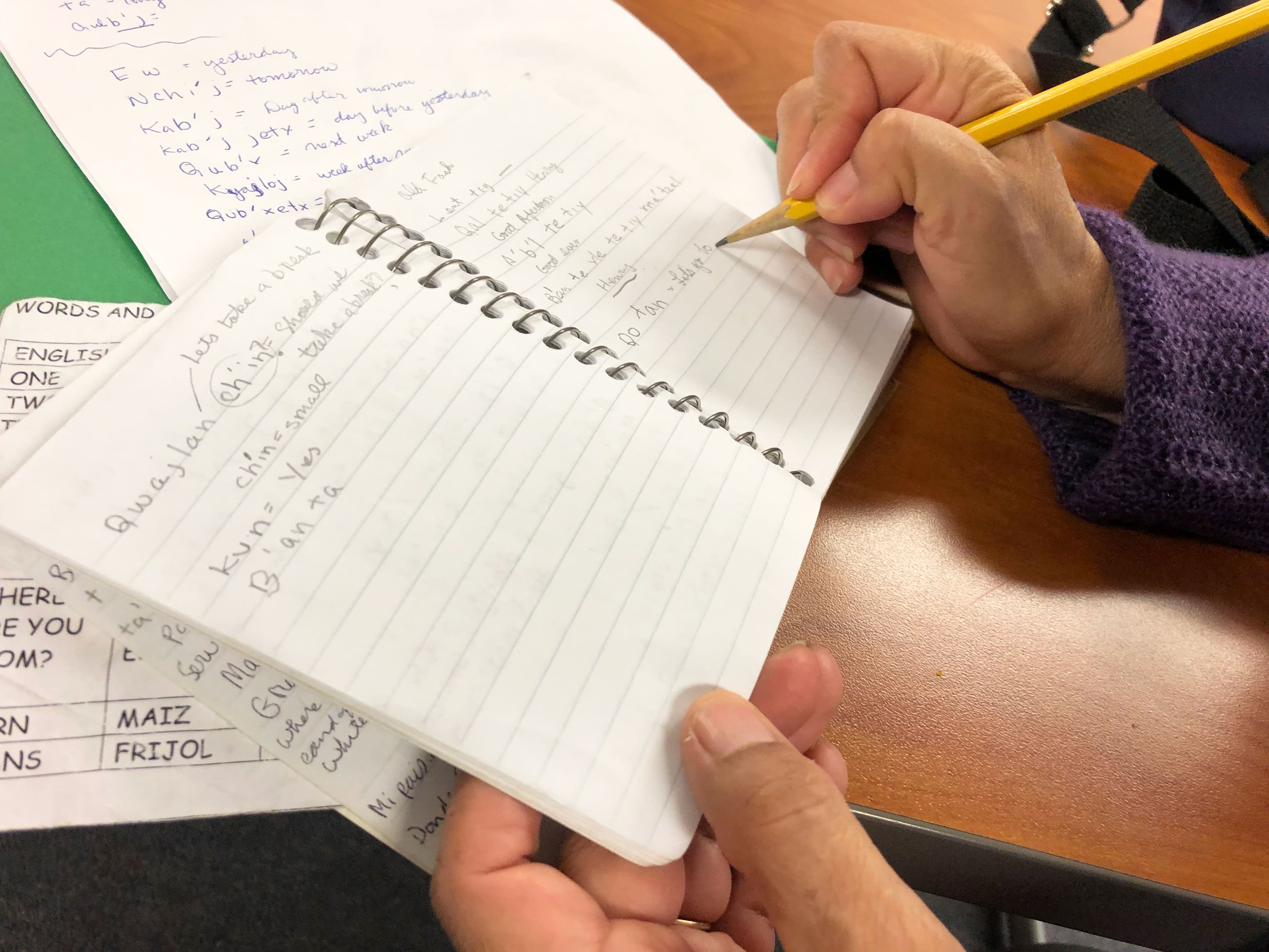 A notebook filled with writing.