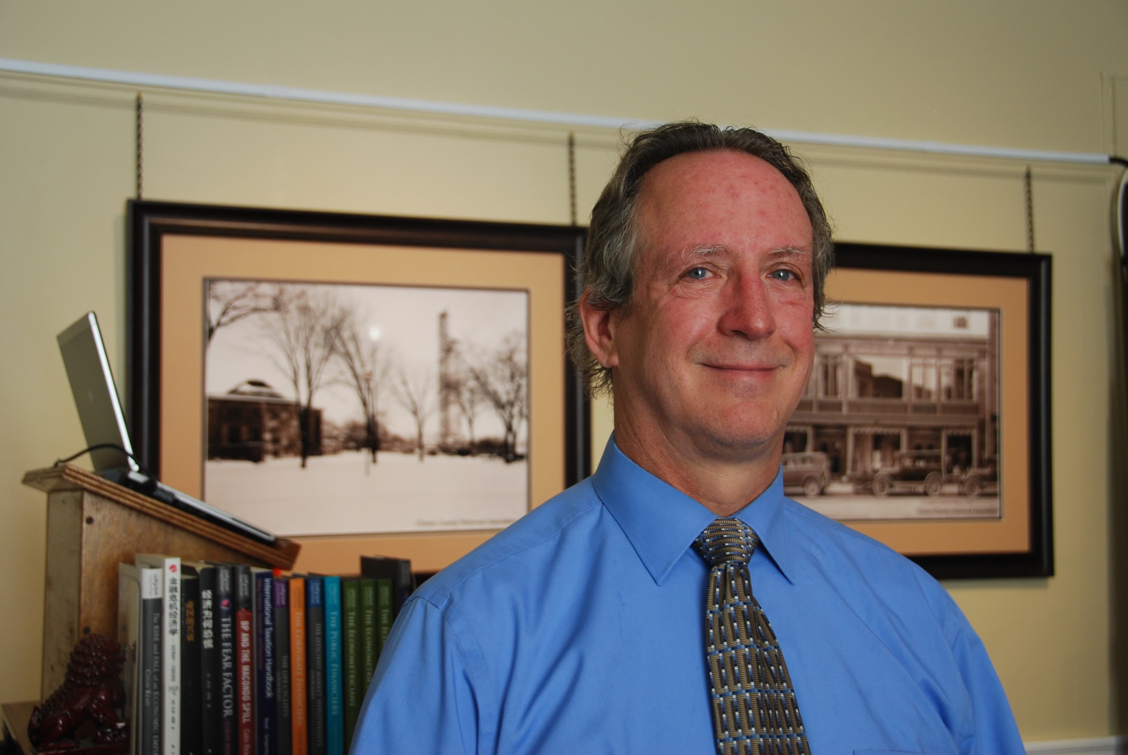 A man poses for a headshot