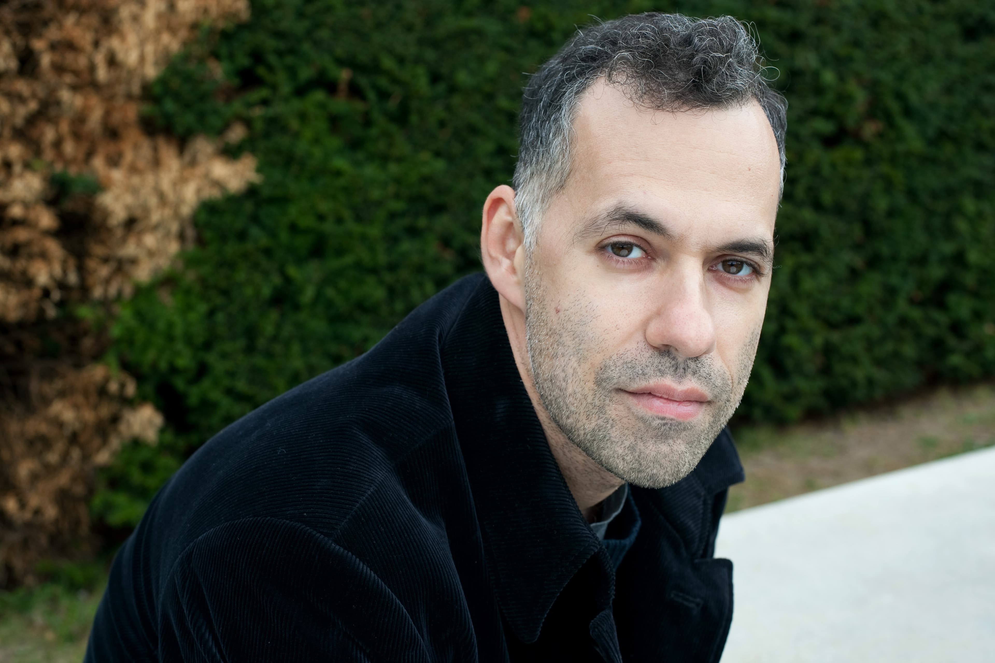 A headshot of a white man