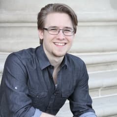 A professional mugshot of a man