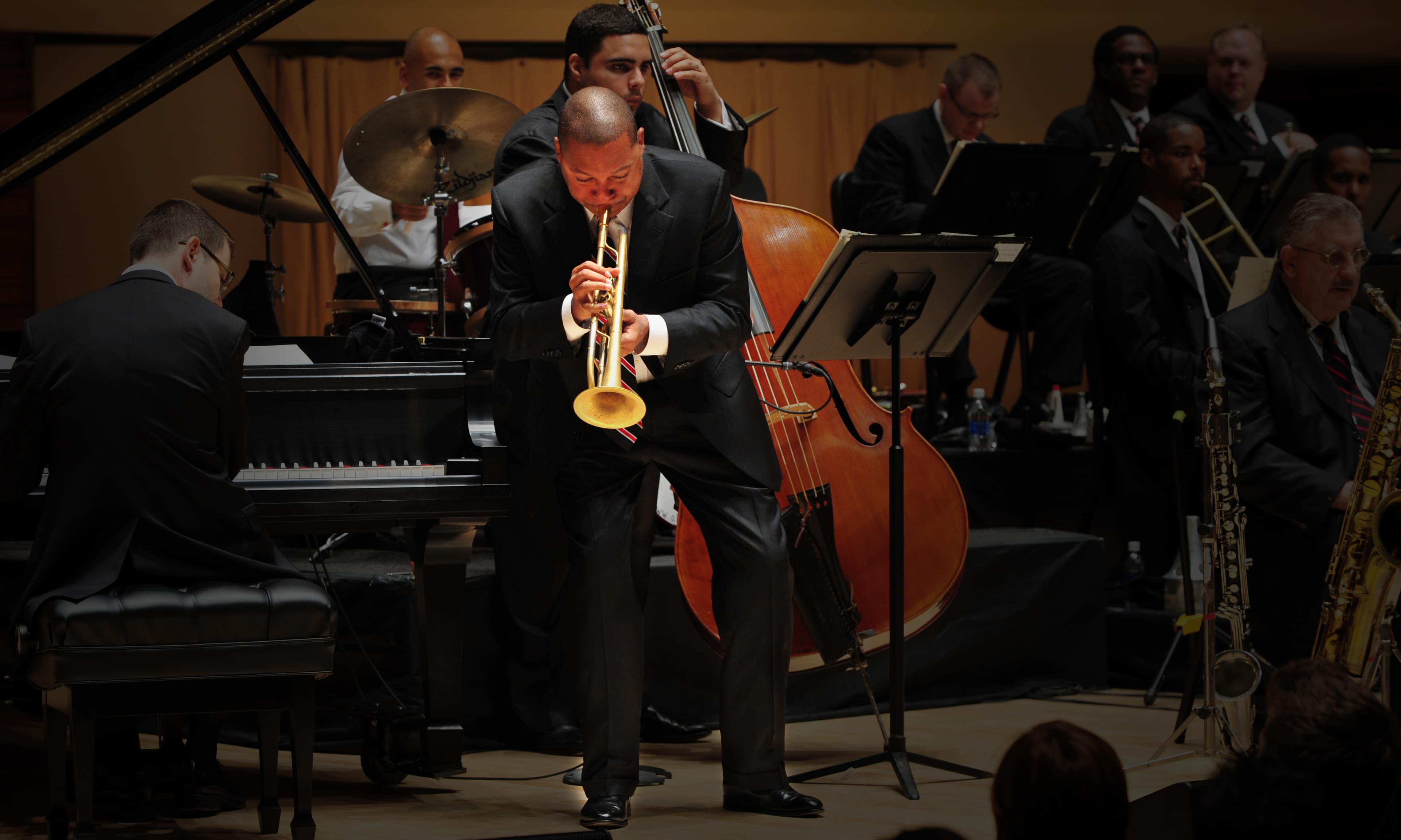 Wynton Marsalis performs on stage.