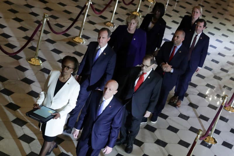 A formal procession is photographed from above