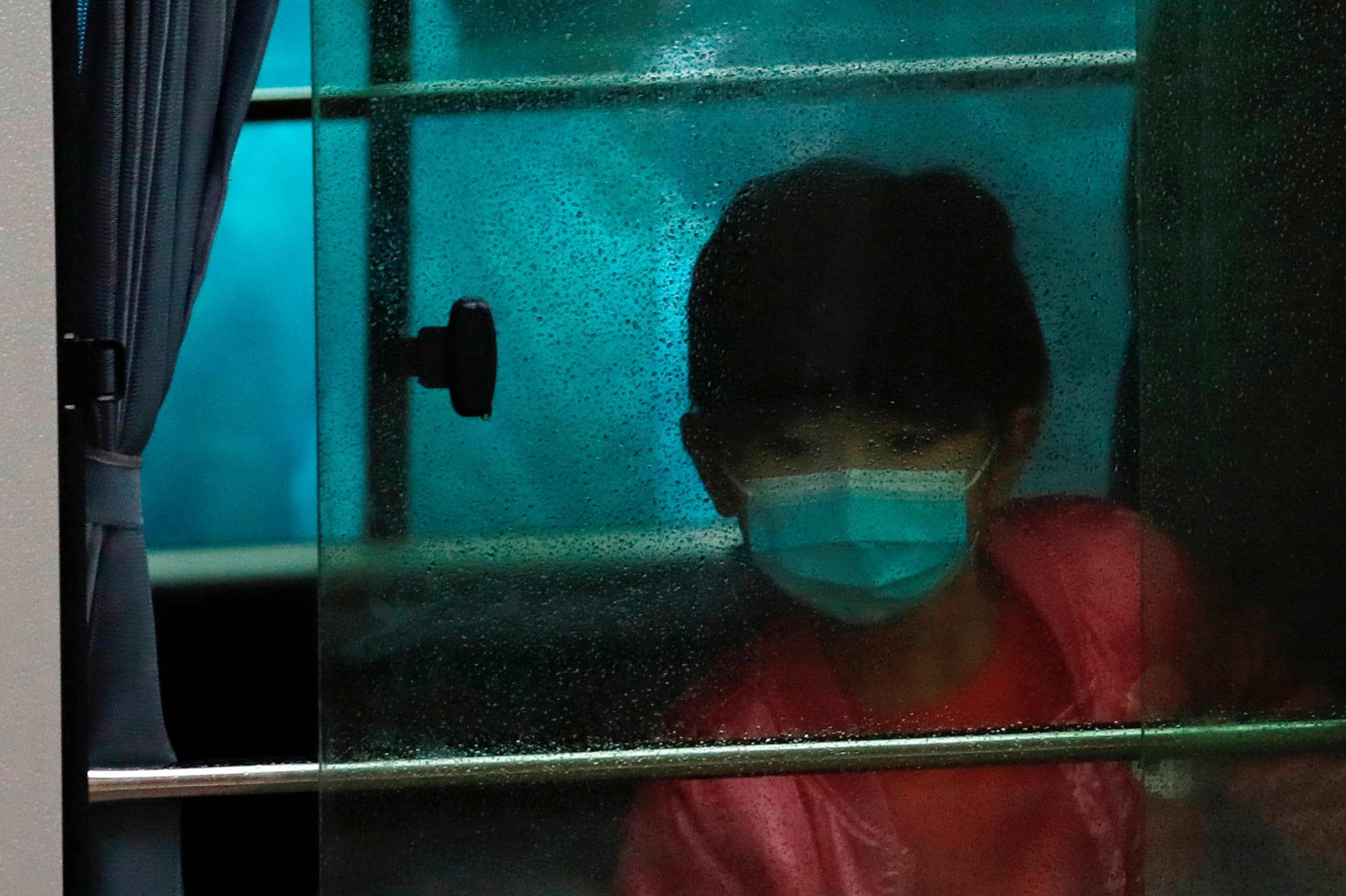 A child wears a face mask