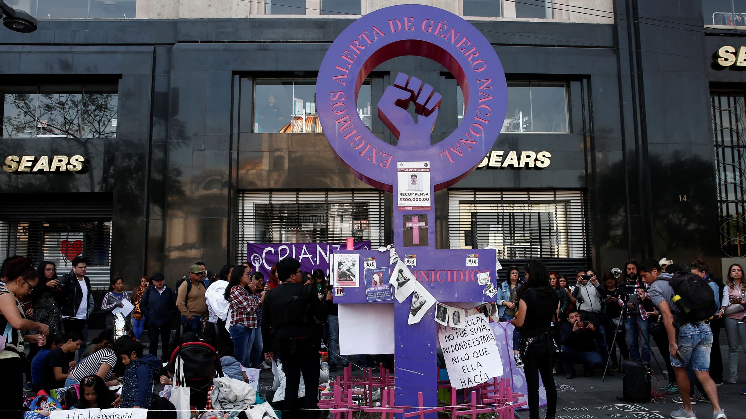 People gather in a memory of seven-year-old Fatima Cecilia Aldrighett, who went missing and whose body was discovered inside a plastic bag, at an anti-femicide monument, in Mexico City, Mexico, Feb. 19, 2020.