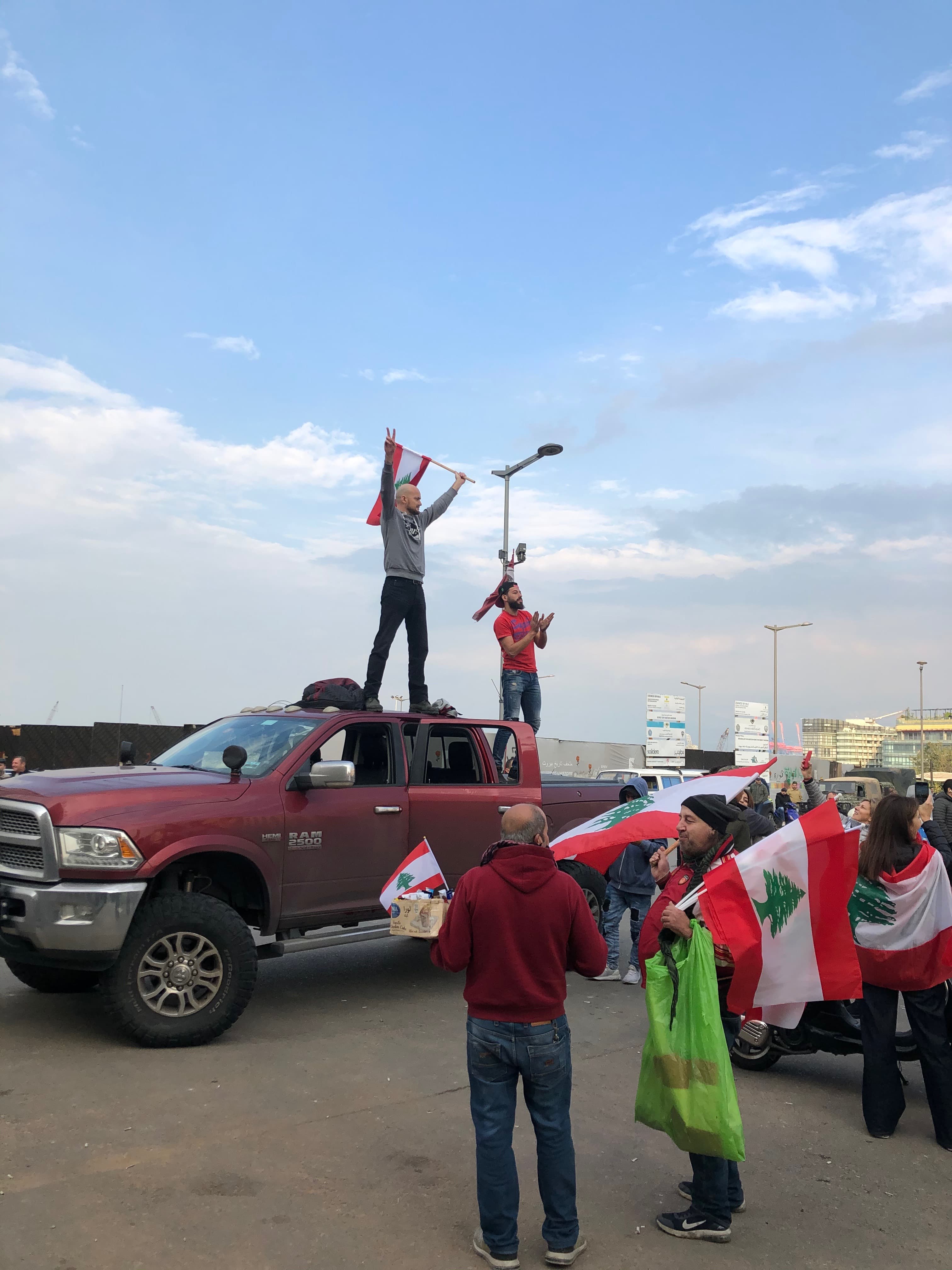 Protester uses his truck to block a road leading to Martyrs' Square in Beirut.