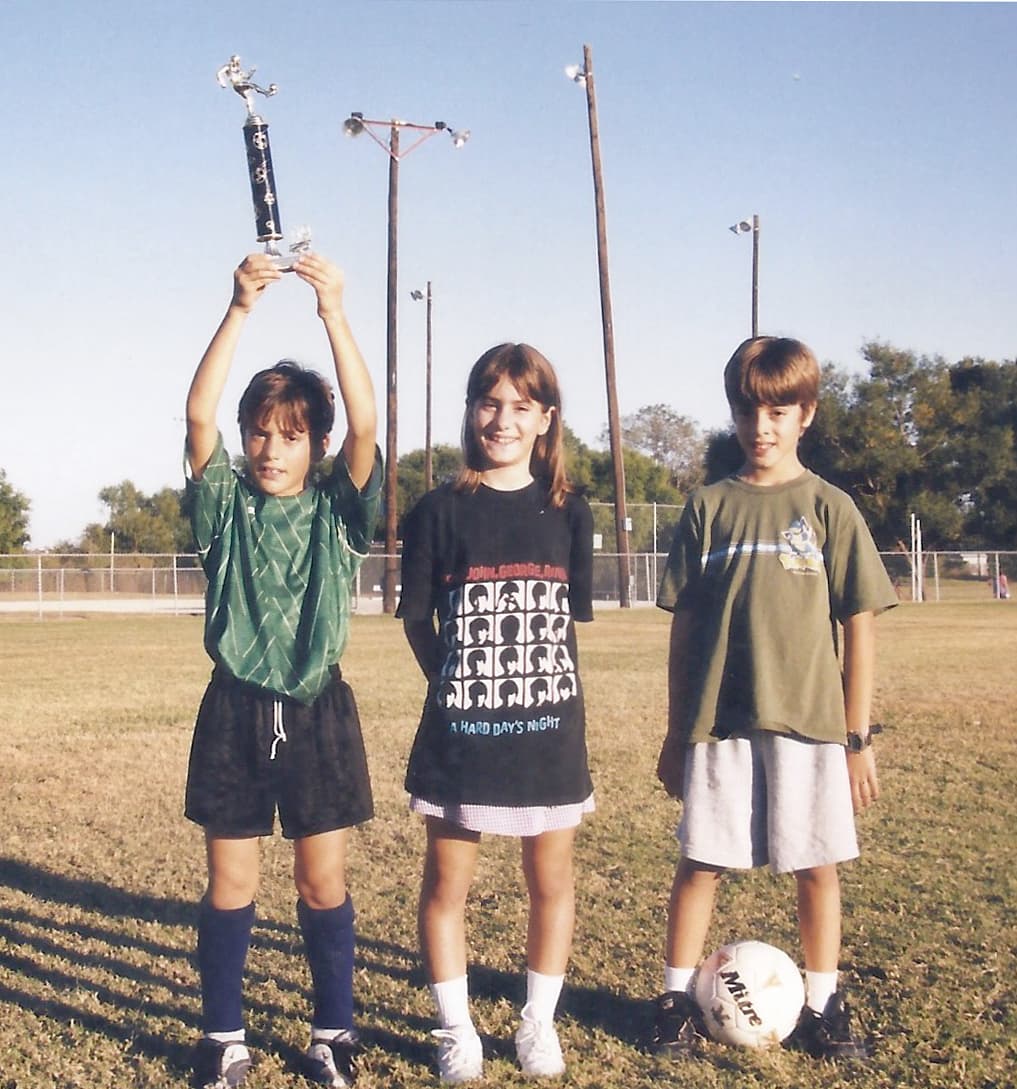 The author, Lucía Benavides, is pictured with her twin brother, Santi and Emi. 