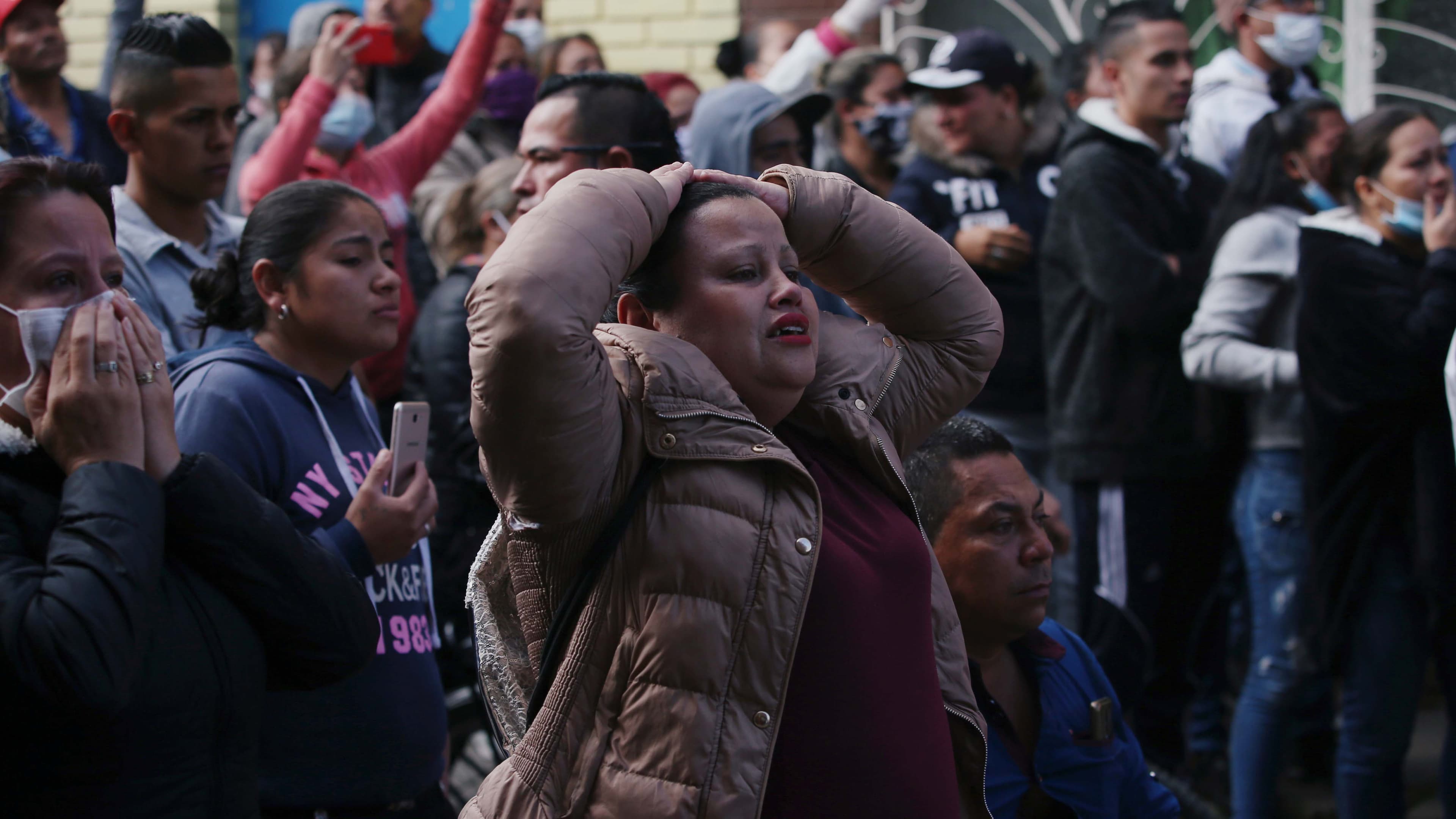Relatives of prisoners react outside La Modelo prison after a riot by prisoners demanding government health measures against the spread of the coronavirus disease (COVID-19) in Bogota, Colombia, on March 22, 2020.