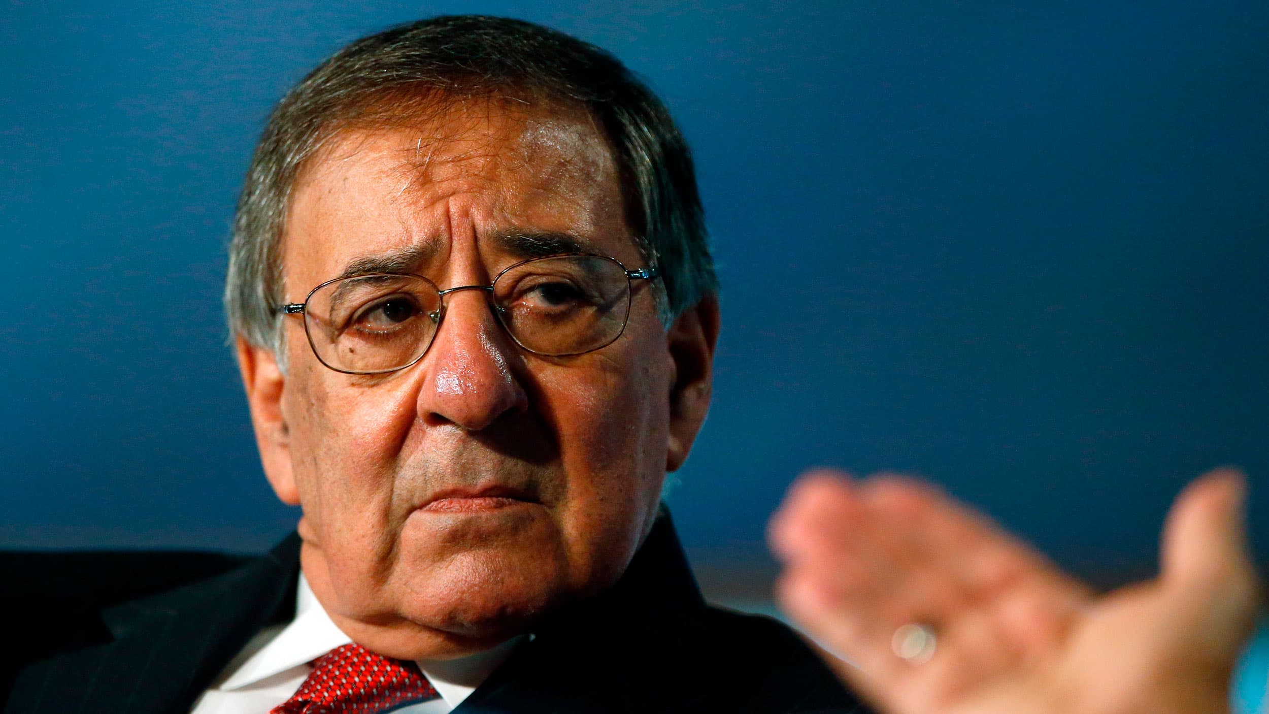 A close up of a man in a suit