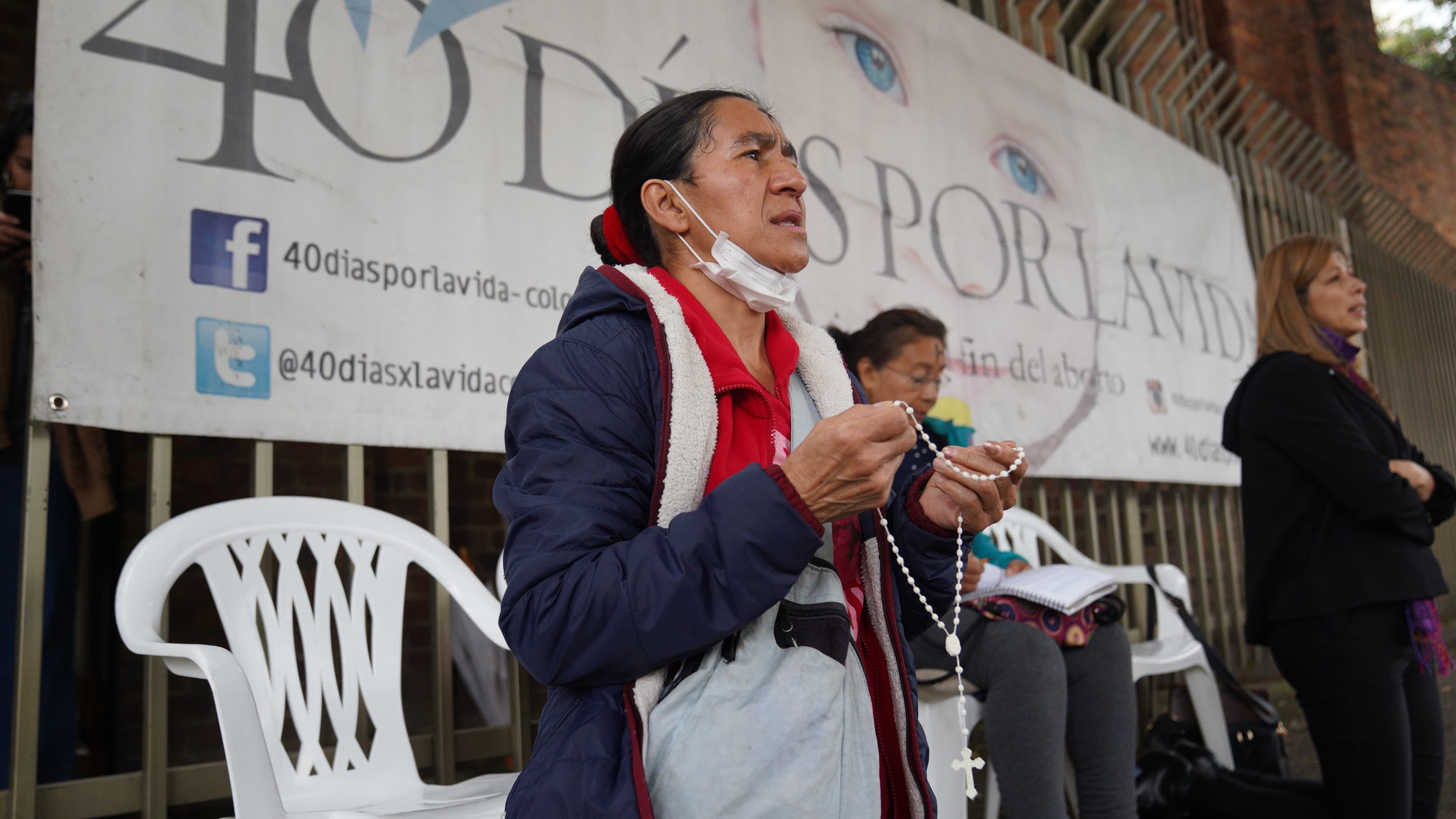 Volunteers from the conservative group 40 Days for Life pray outside an abortion clinic in Bogotá, Colombia, on Wednesday, Feb. 26, 2020.