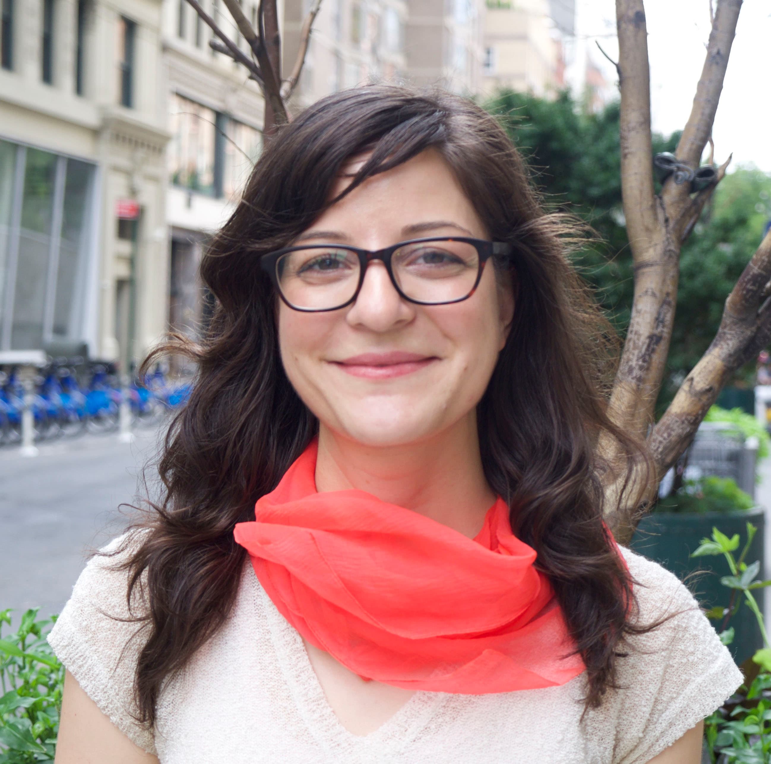 Head shot of a woman with brown hair