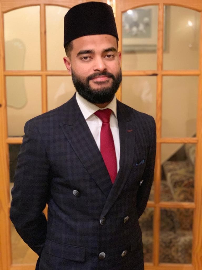 A portrait of Noor Hadi, an imam in south London.