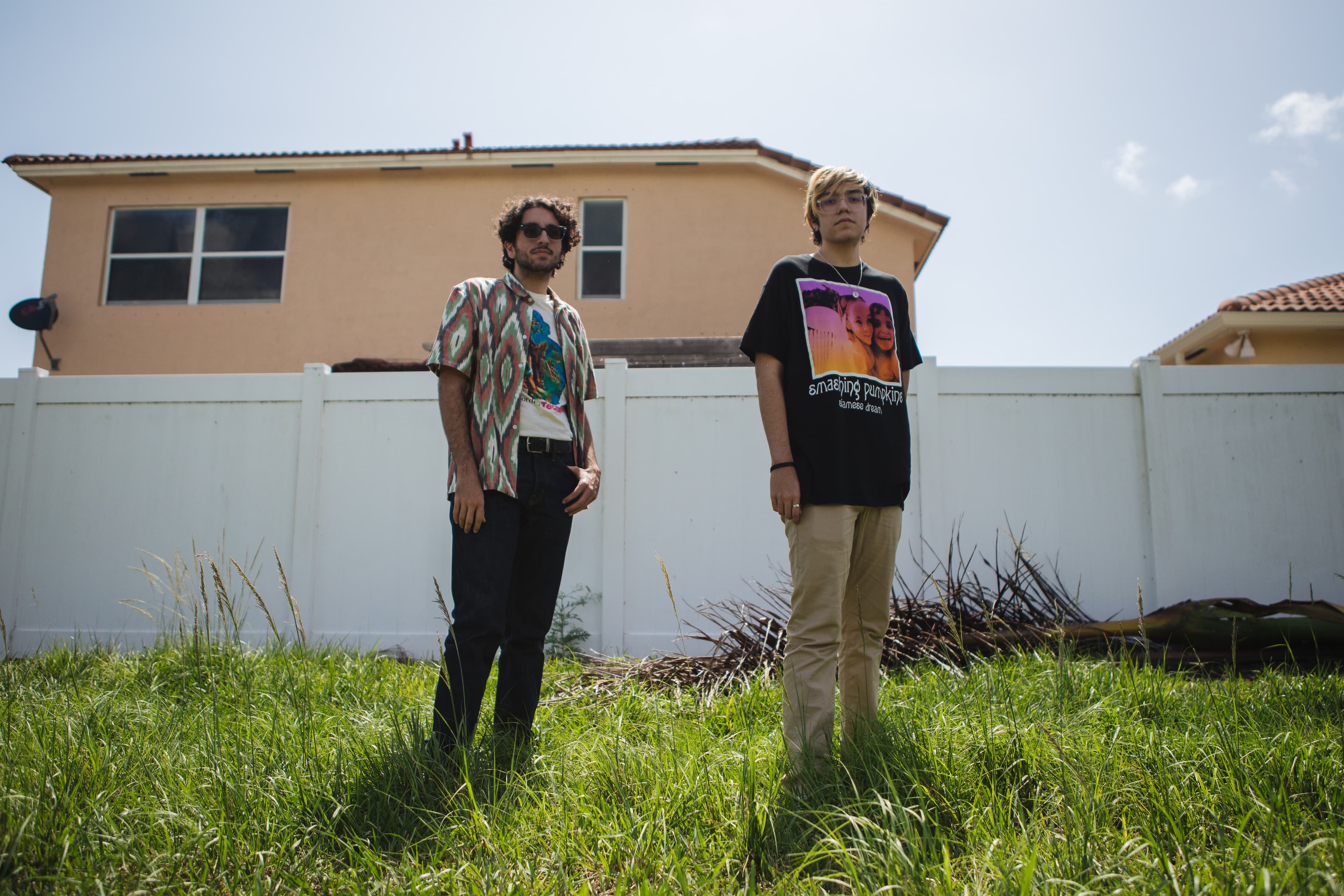 Tristan, left, and Jacob Cuenca in their neighborhood in Homestead, Florida, on May 21, 2020.