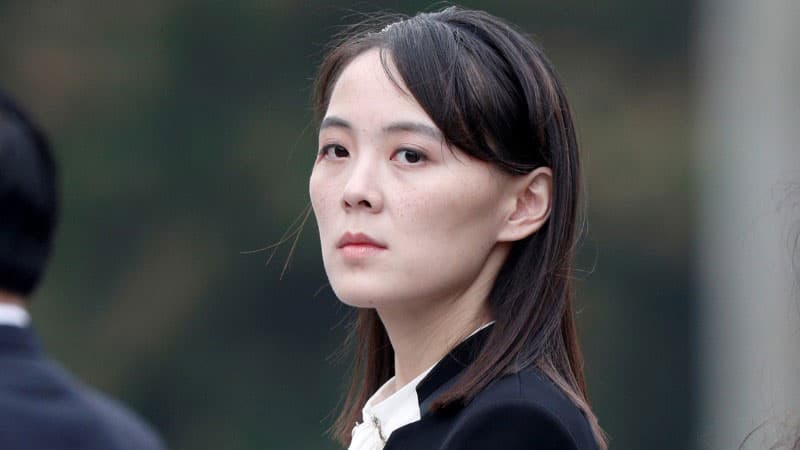 Kim Yo-jong is shown looking over her left shoulder