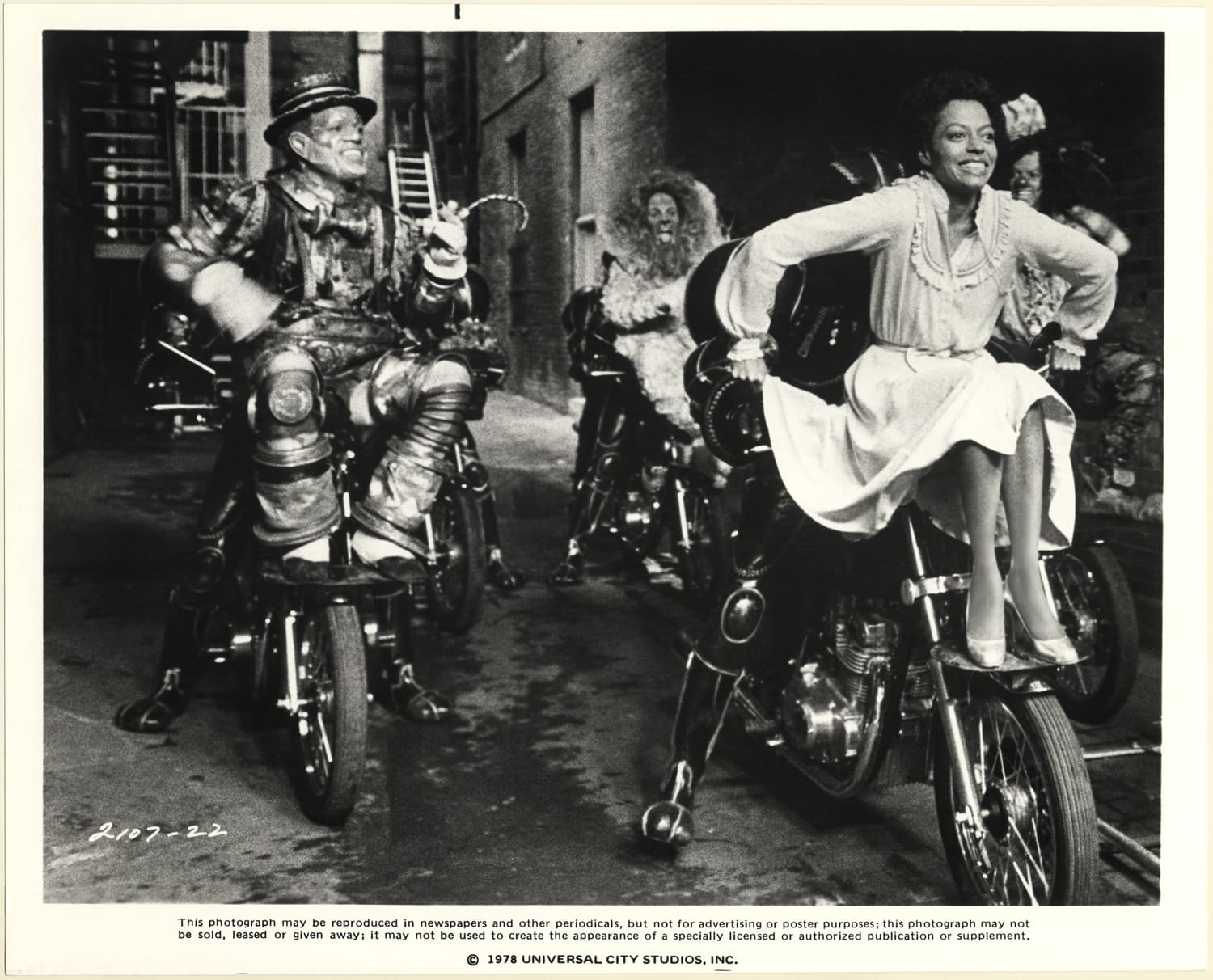 Diana Ross, as Dorothy, Nipsey Russell, as the Tinman (left foreground), Ted Ross, as the Lion (center background) and Michael Jackson, as the Scarecrow (right background) in “The Wiz,” filmed at Kaufman Astoria Studios.