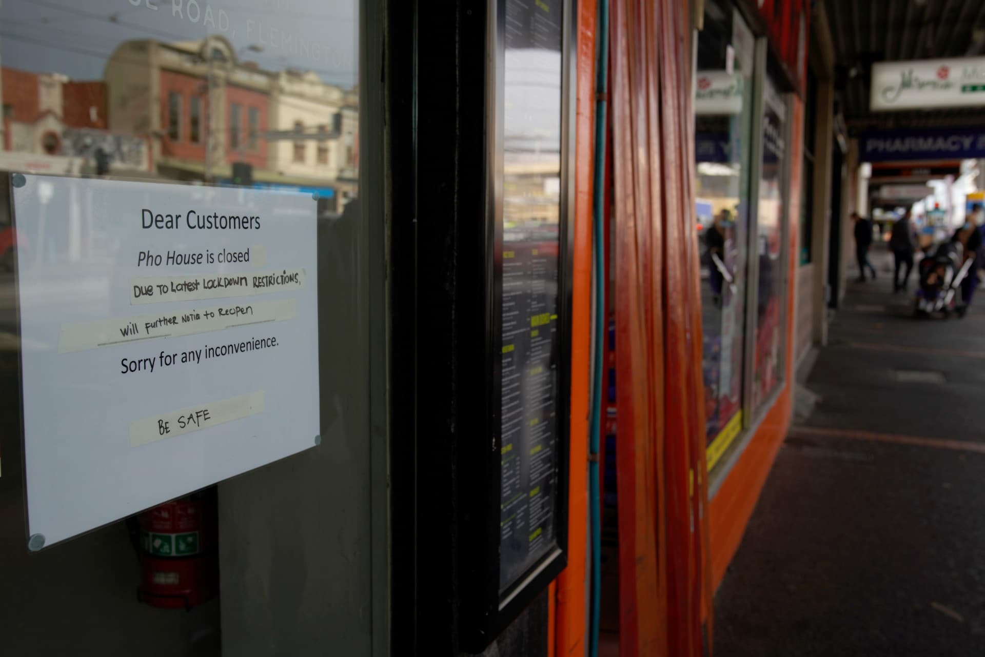 A restaurant posts a closed sign in Melbourne