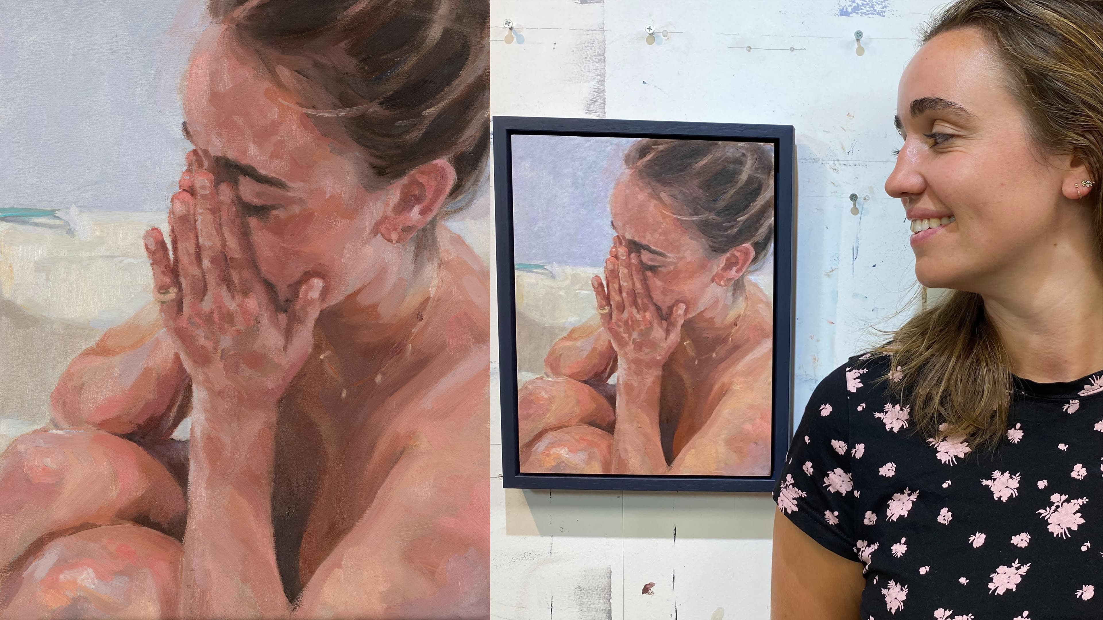 Dr. Georgina Keogh, a doctor at St George’s Hospital in London, stands beside a portrait of her painted by artist Jane Clatworthy as part of an NHS portrait series project.