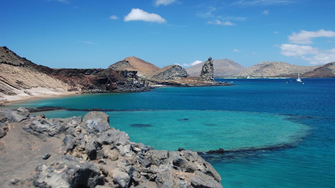 An image of blue water surrounding the Galápagos Islands.