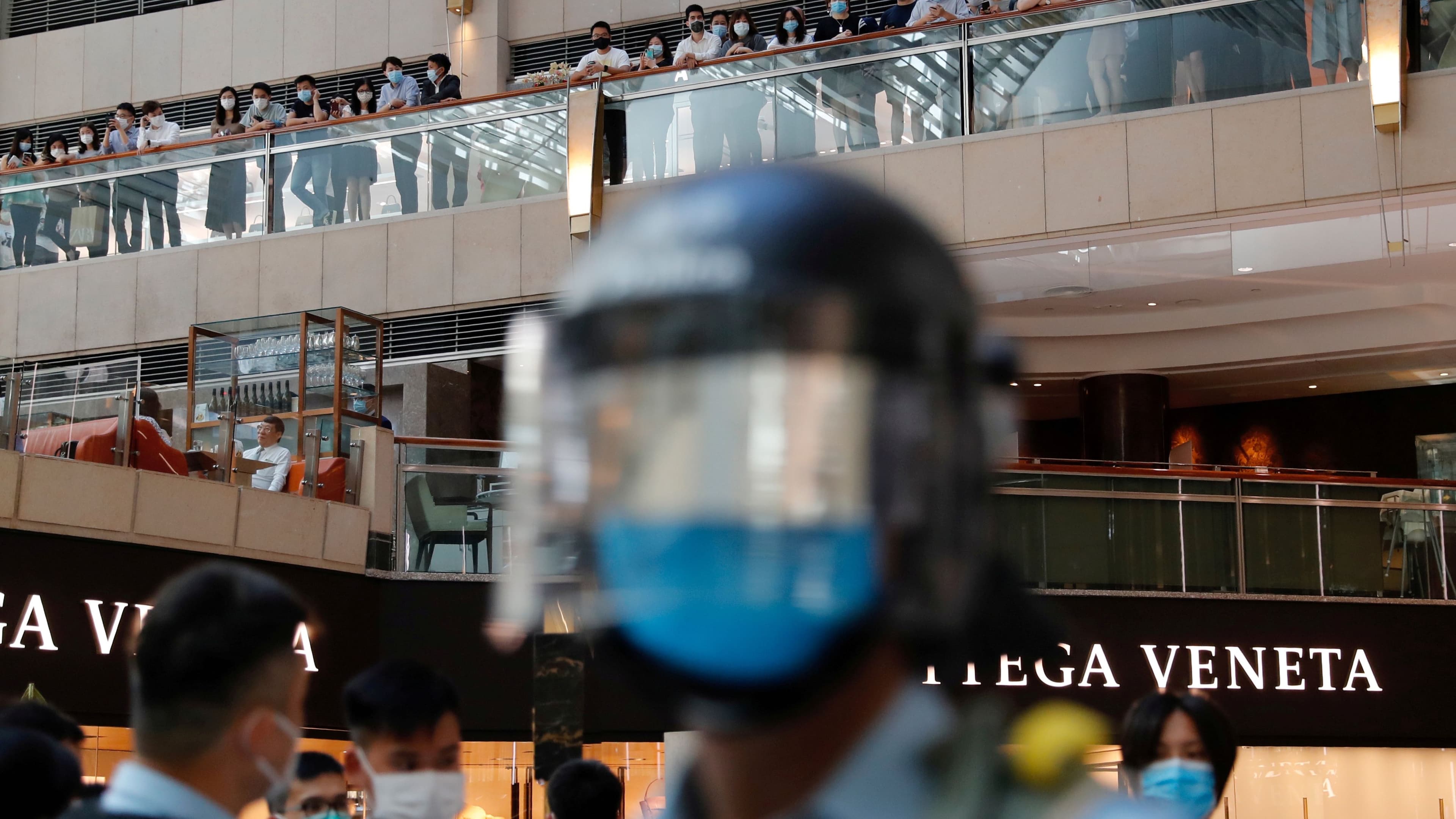 Riot police patrol at a shopping mall during a protest after China's parliament passes a national security law for Hong Kong, in Hong Kong, June 30, 2020.
