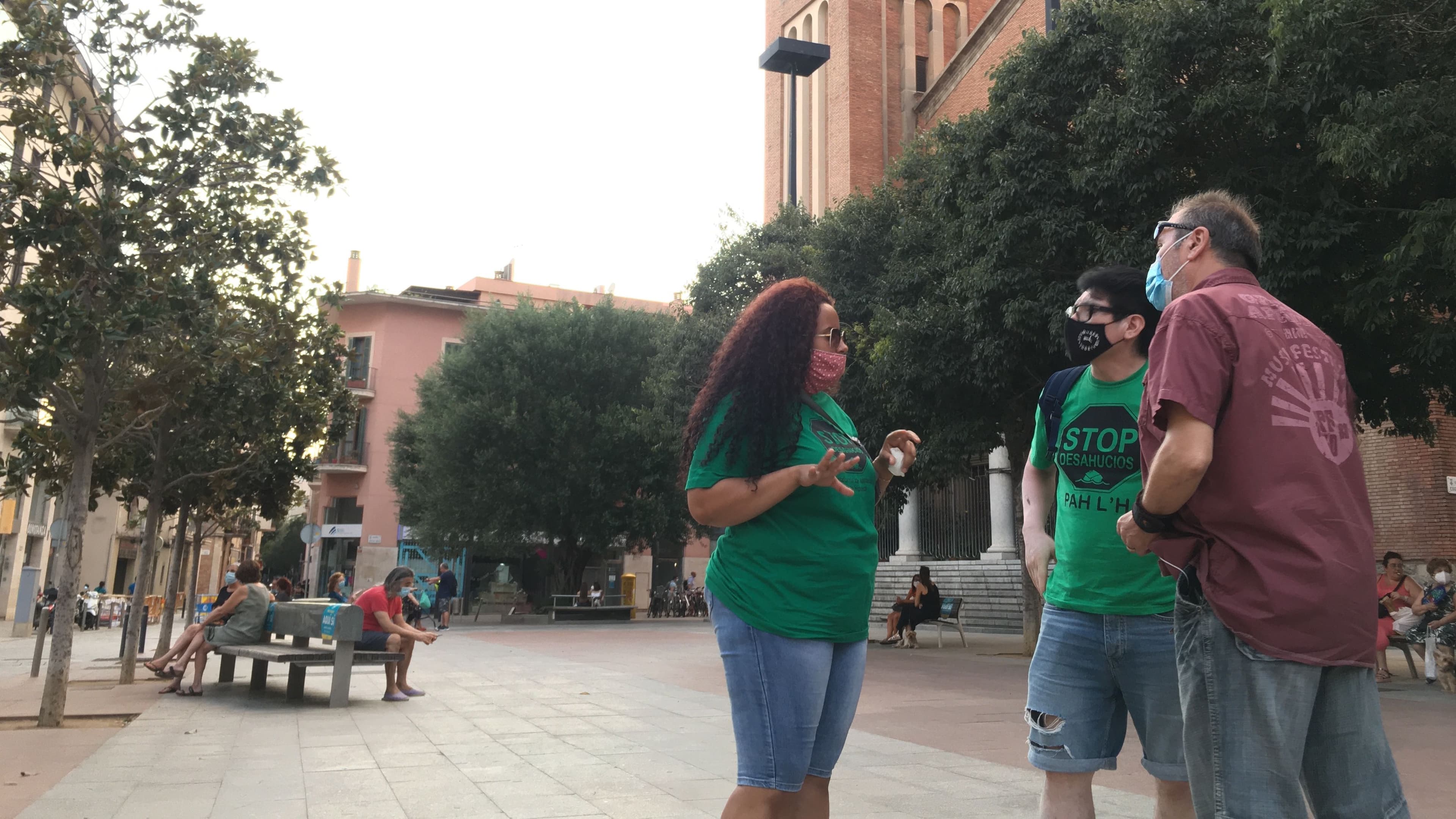 Marly Estrella is pictured with activists Luis Enrique Rumaldo (left) and Manuel Rico in L'Hospitalet de Llobregat near Barcelona.