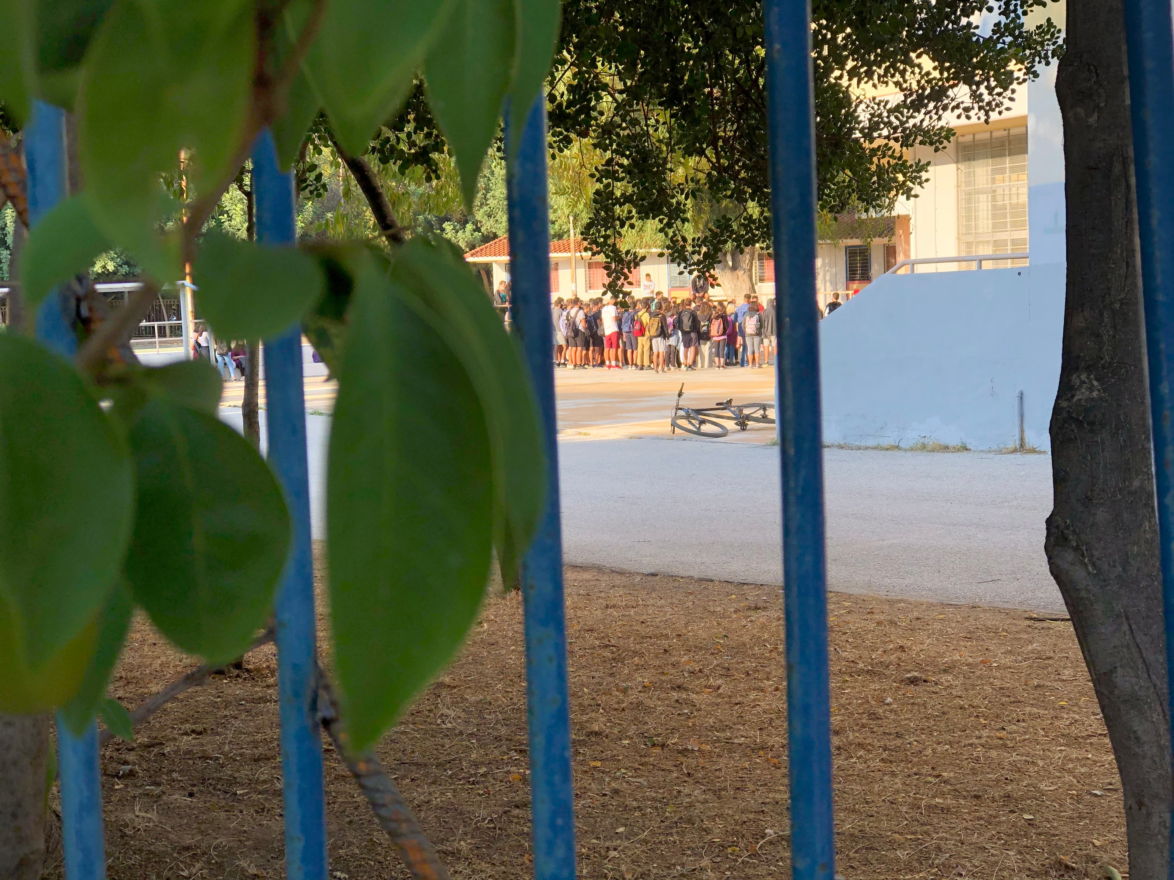 Students at the 5th Public High School of Egaleo gather inside the school yard to vote on whether to occupy the school for the day