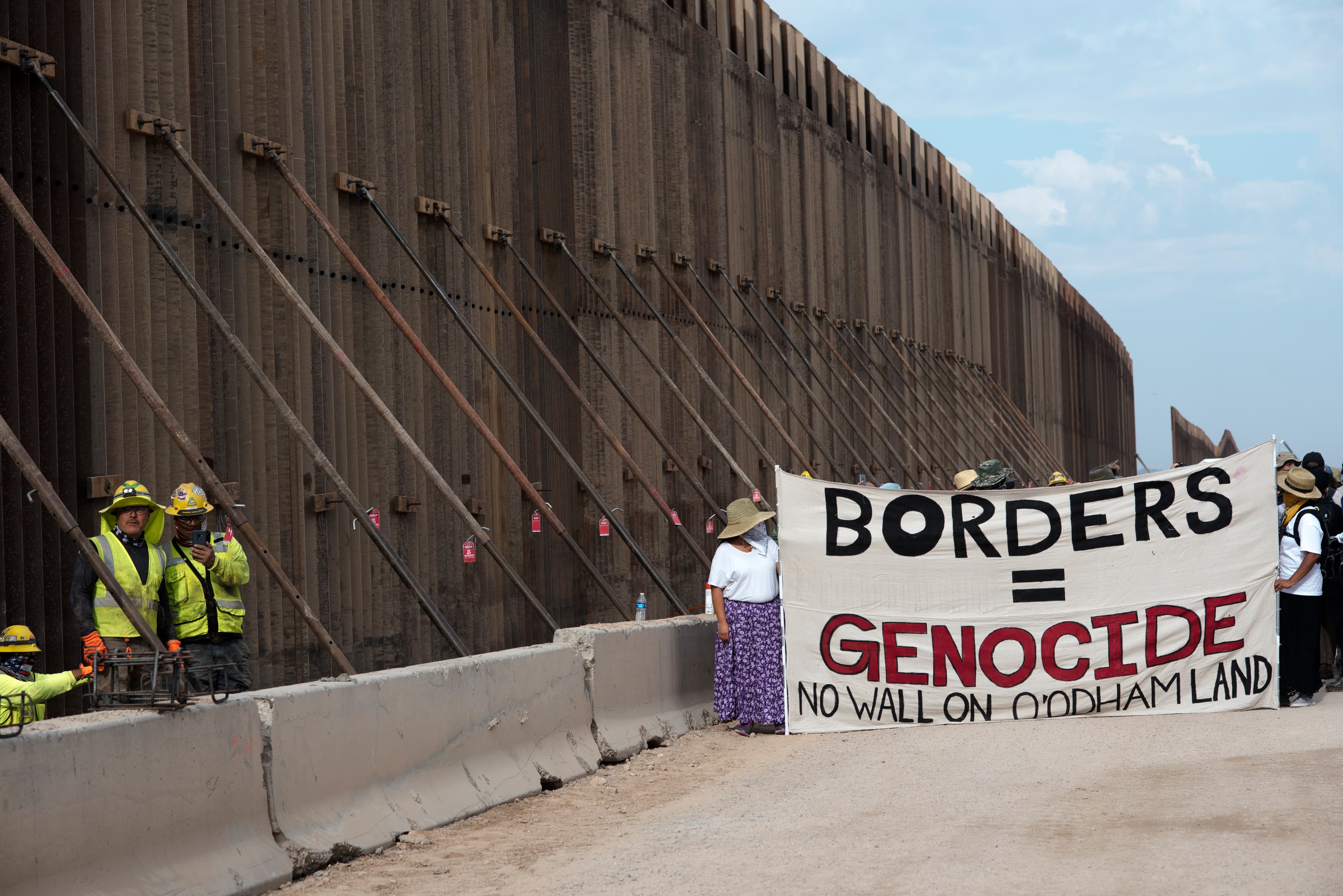 Protesters say they will hold President-elect Joe Biden to account on his promise to stop the Trump administration's border wall construction.