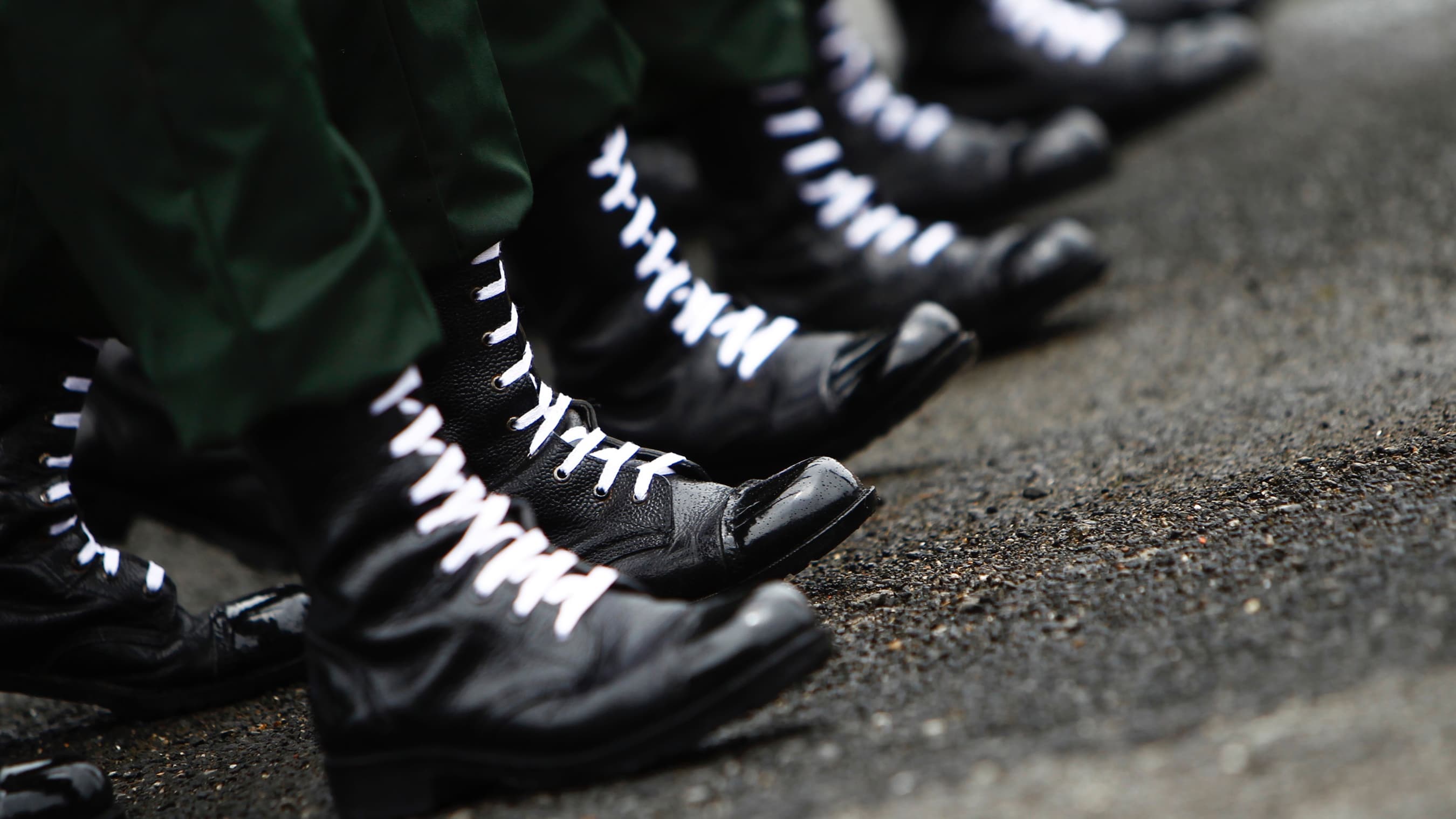 Former rebel fighters parade during a ceremony at Nepalese Military Academy in Kharipati, Nepal, Aug. 26, 2013. 