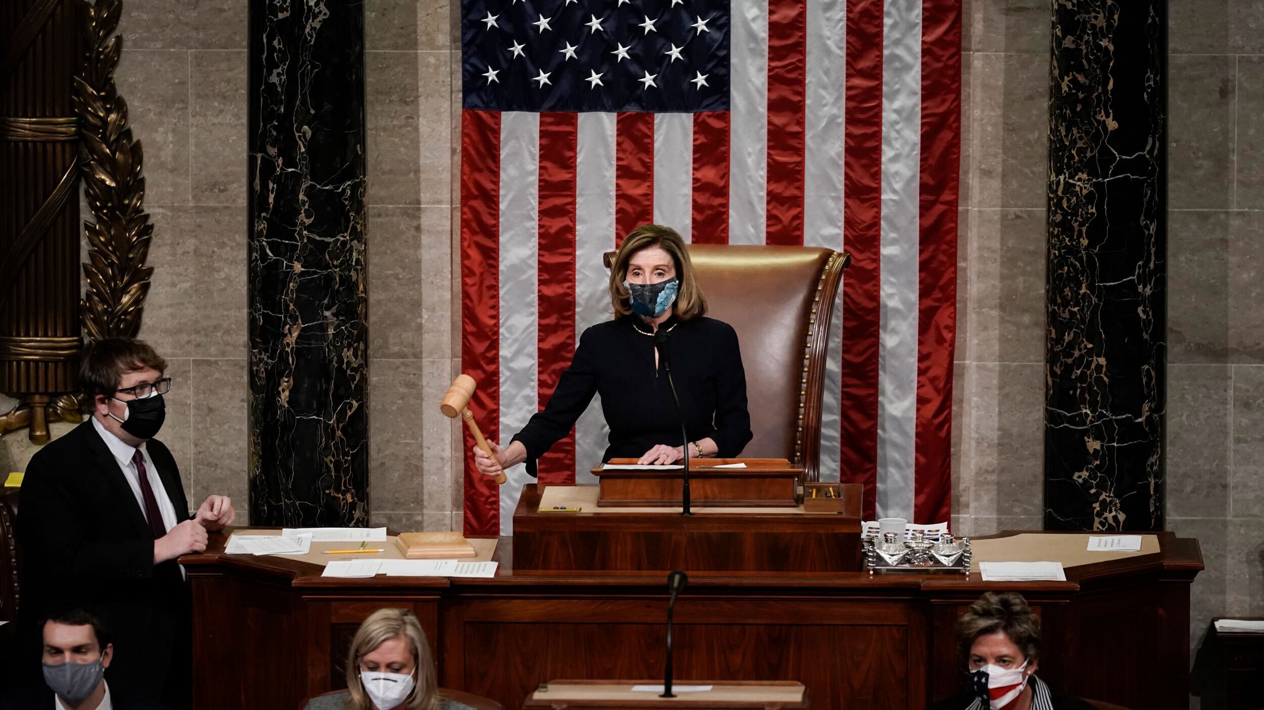 Speaker of the House Nancy Pelosi gavels in the final vote of the impeachment of President Donald Trump