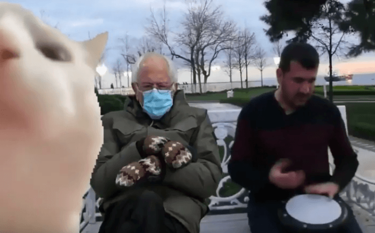 A screen grab of a YouTube video of the cat vibing to Ievan Polkka meme, now with the Bernie Sanders meme.
