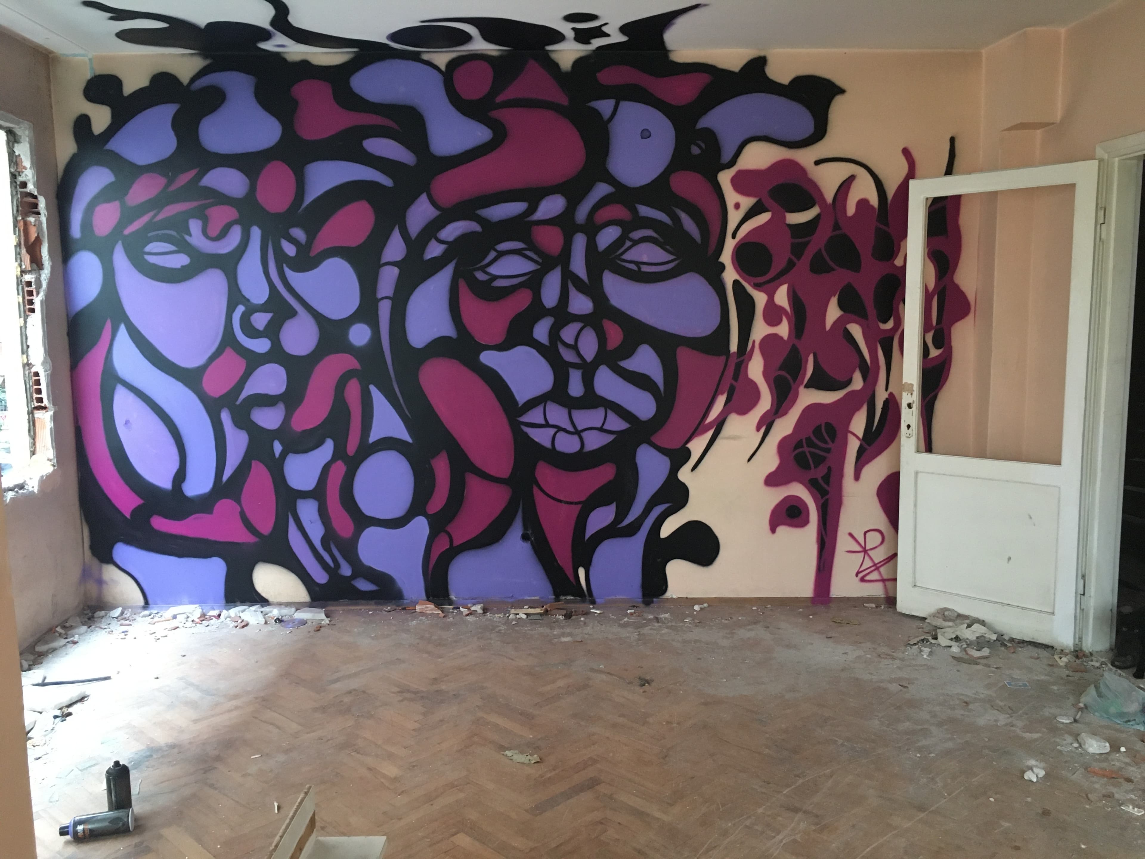 This is “Mikrotopya,” a collection of installations, graffiti art and sculptures of found items created by 16 artists in an empty, four-story apartment building slated for demolition as part of an extensive urban renewal project. The art can be found thro