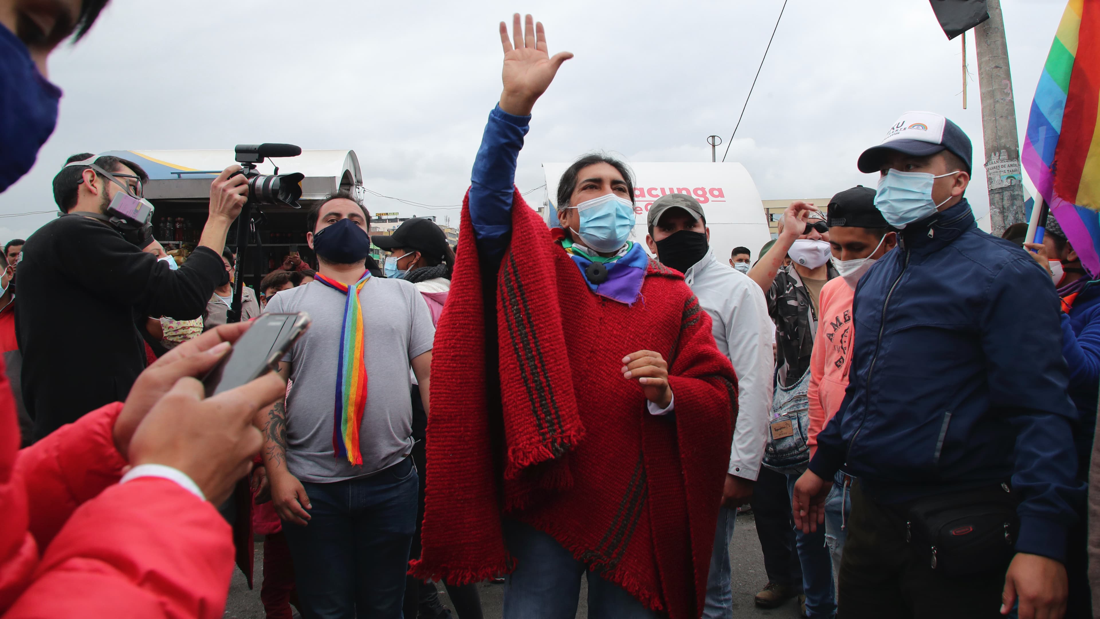 Presidential candidate Yaku Pérez greets supporters as he leads a protest march to Quito, in Latacunga, Ecuador, Feb. 22, 2021. Pérez, who came in a close third in the recent elections, has alleged fraud after the results indicated he had fallen just shor