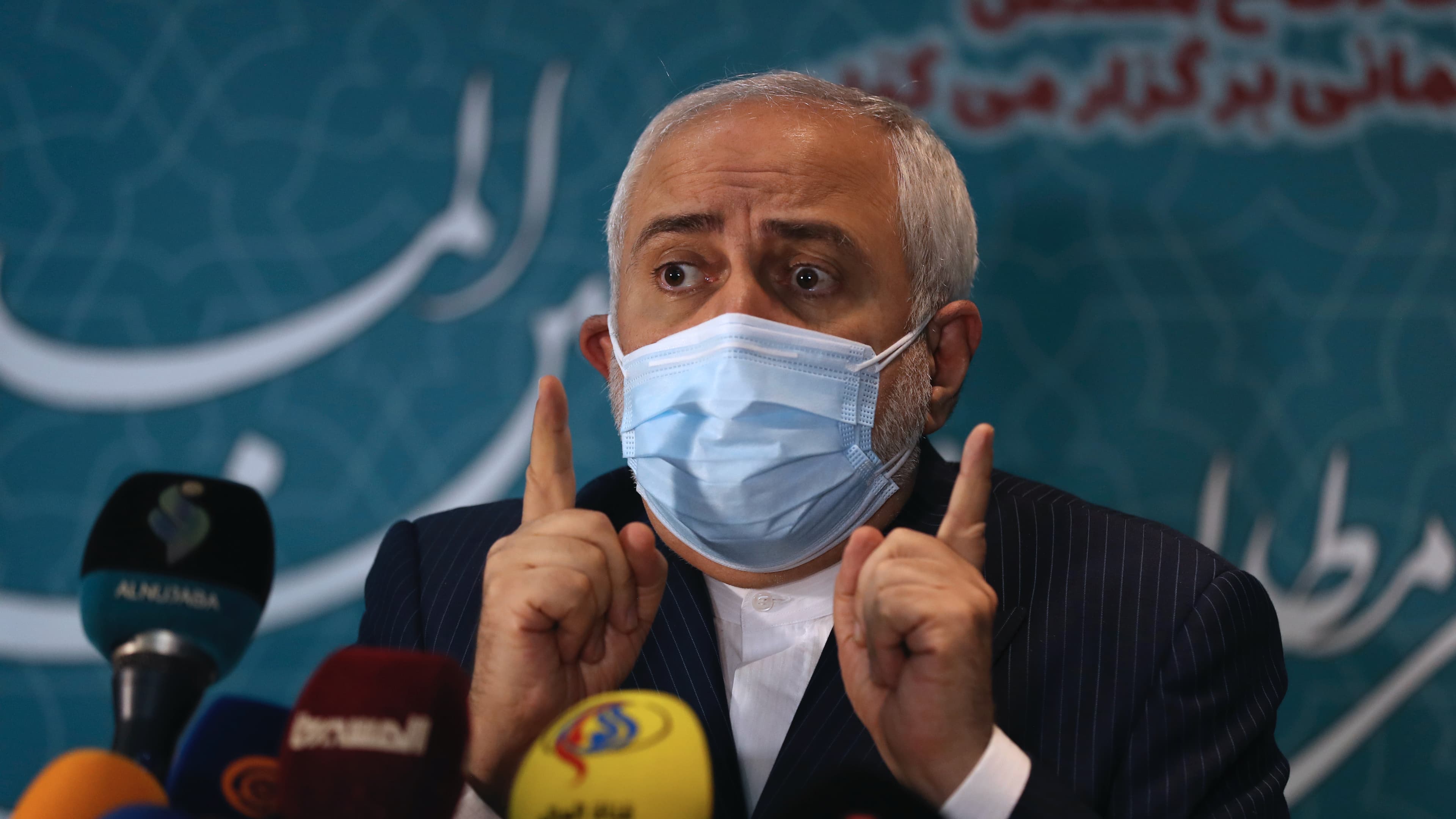 Iran's Foreign Minister Mohammad Javad Zarif speaks with journalists following a conference in Tehran, Iran, Feb. 23, 2021. 