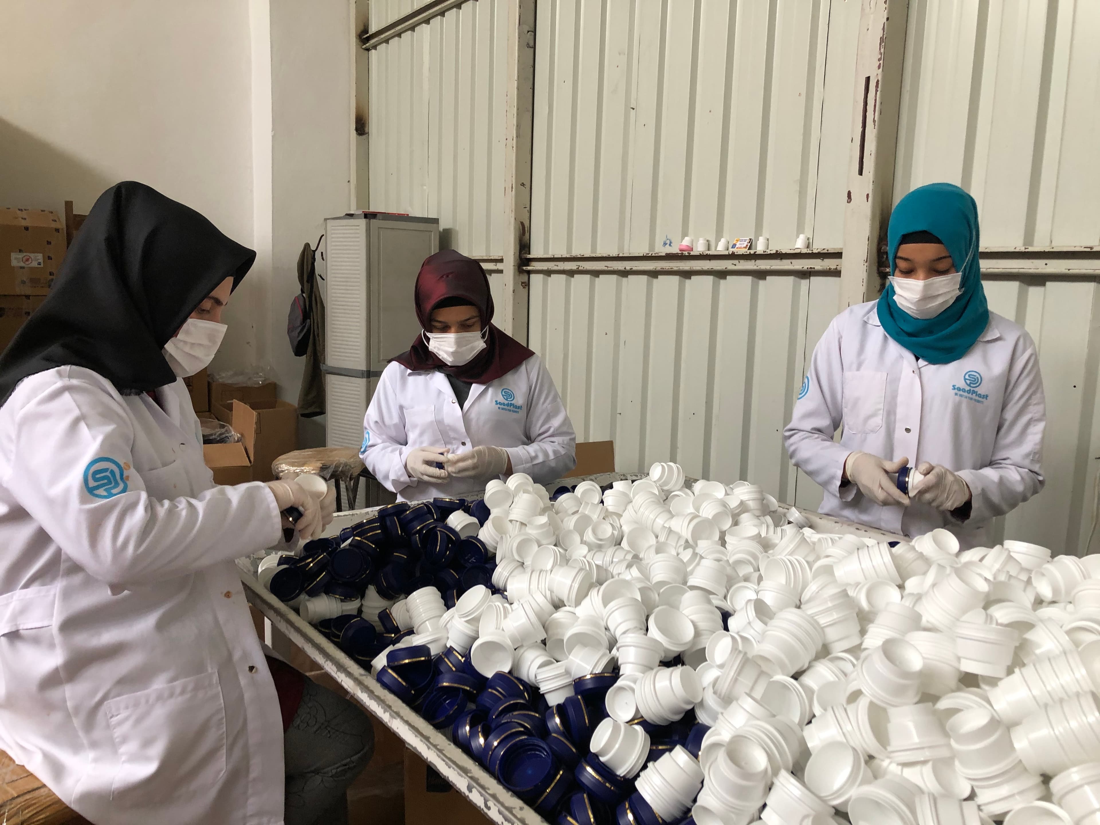Workers at the plastic factory in Gaziantep, Turkey. Saad Chouihna started the business in Gaziantep after his family's business in Aleppo was burned down by Syrian security forces.