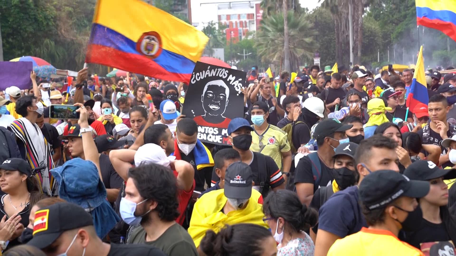 A sign reading “how many more” is displayed during a protest in Cali, Colombia on May 28. Calls for police reform have increased after dozens have been killed in the current wave of protests.