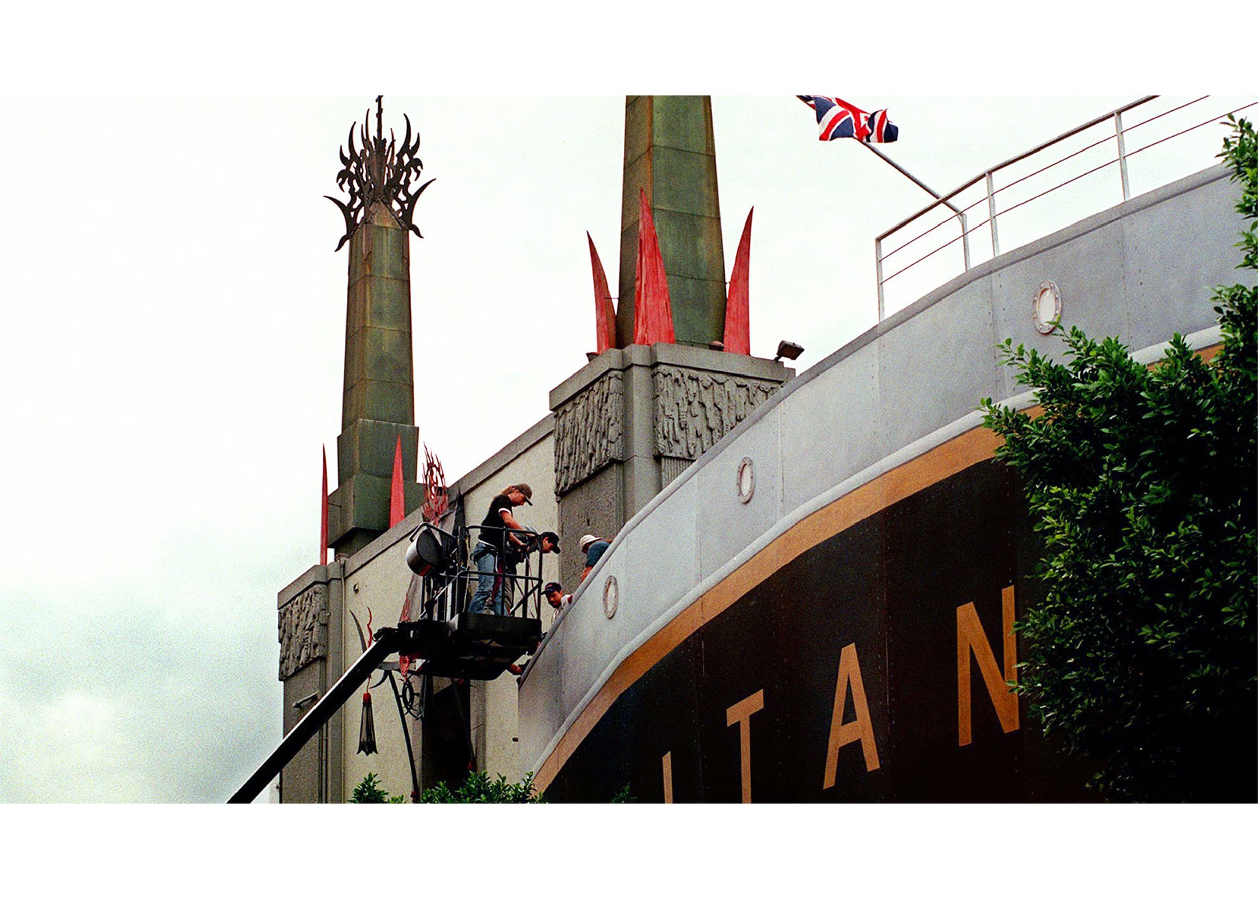 People working on a replica display of the Titanic