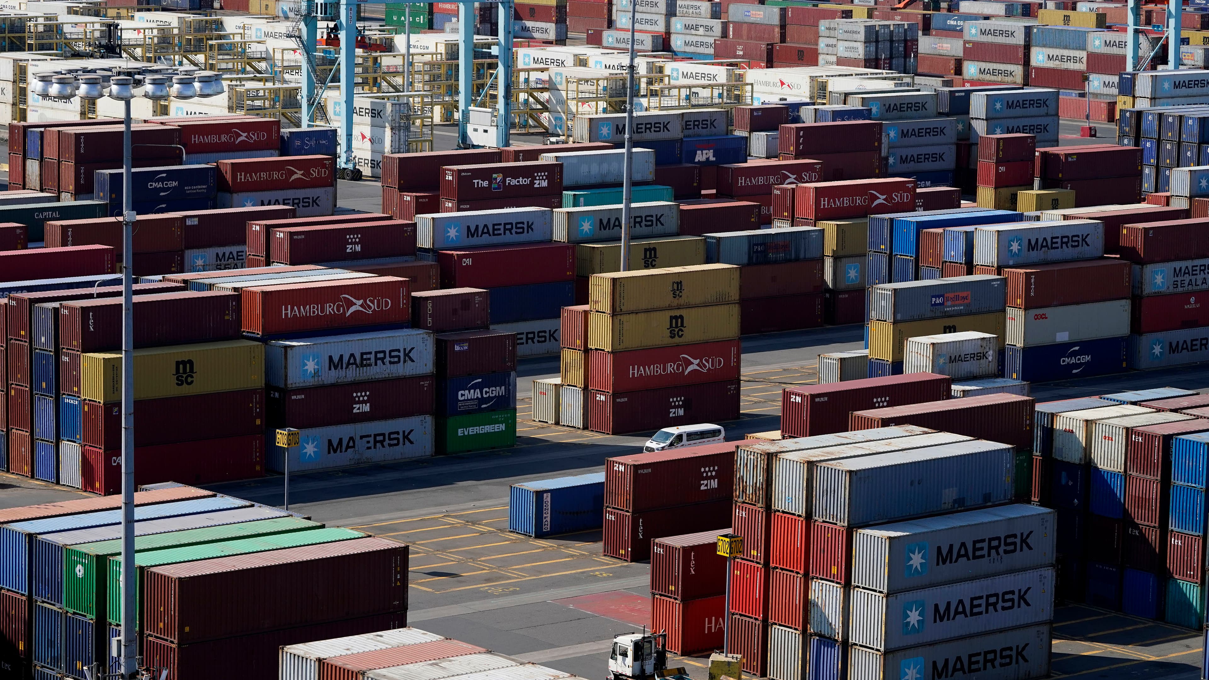 Shipping containers are stacked in the Port of New York and New Jersey in Elizabeth, New Jersey, May 20, 2021.