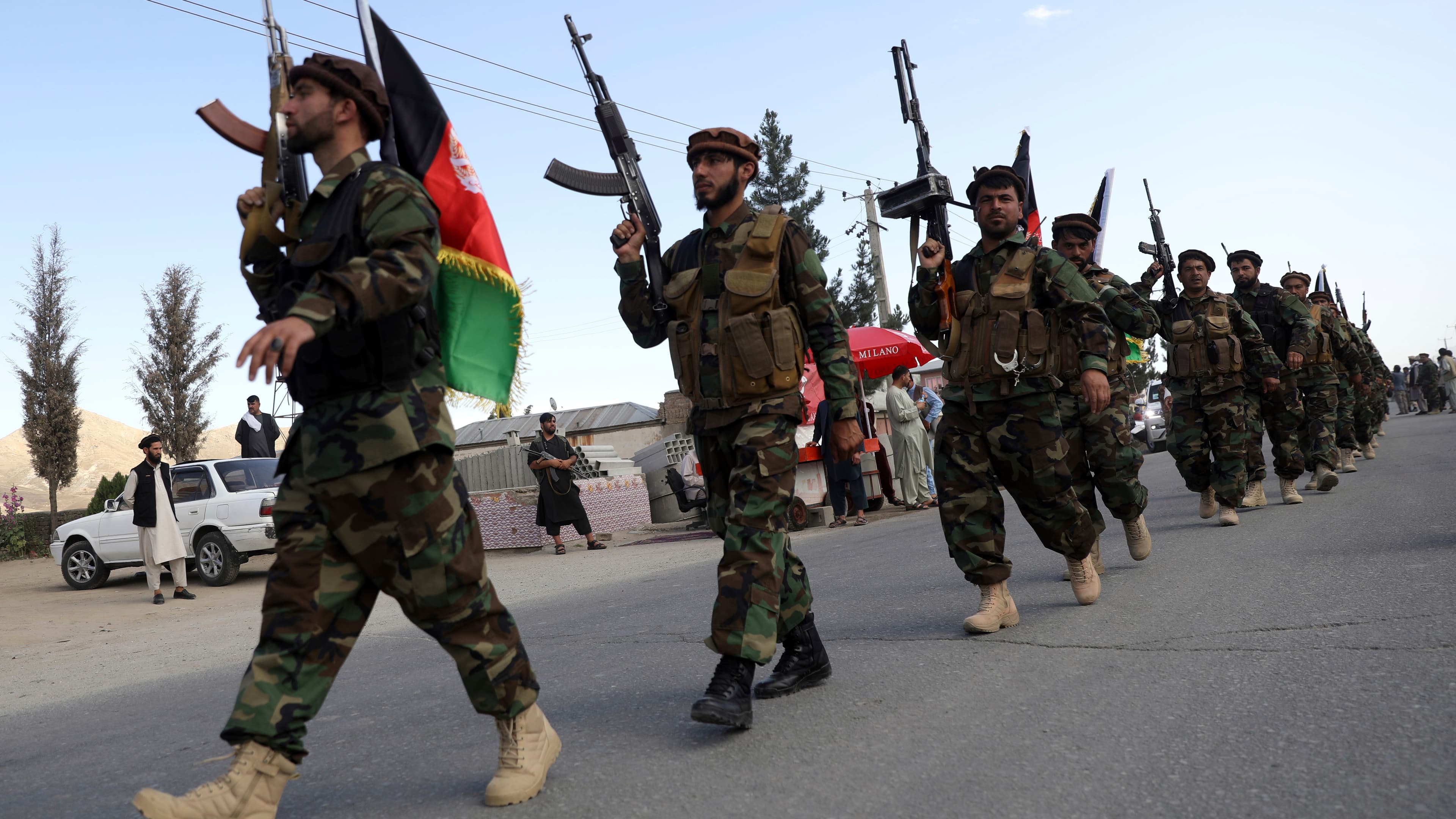 Afghan militiamen join Afghan defense and security forces during a gathering in Kabul, Afghanistan, Wednesday, June 23, 2021. 