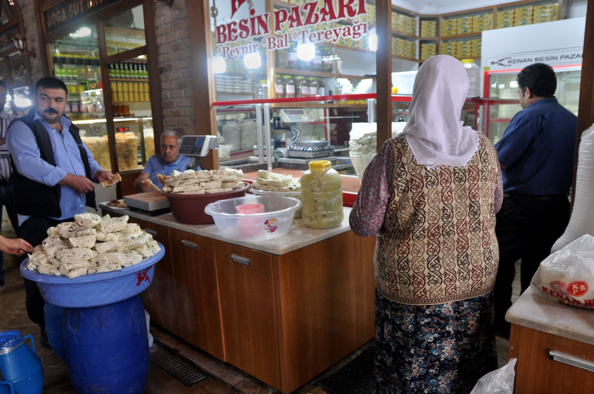 Customers outside a shop in the historic cheese market in central Van.