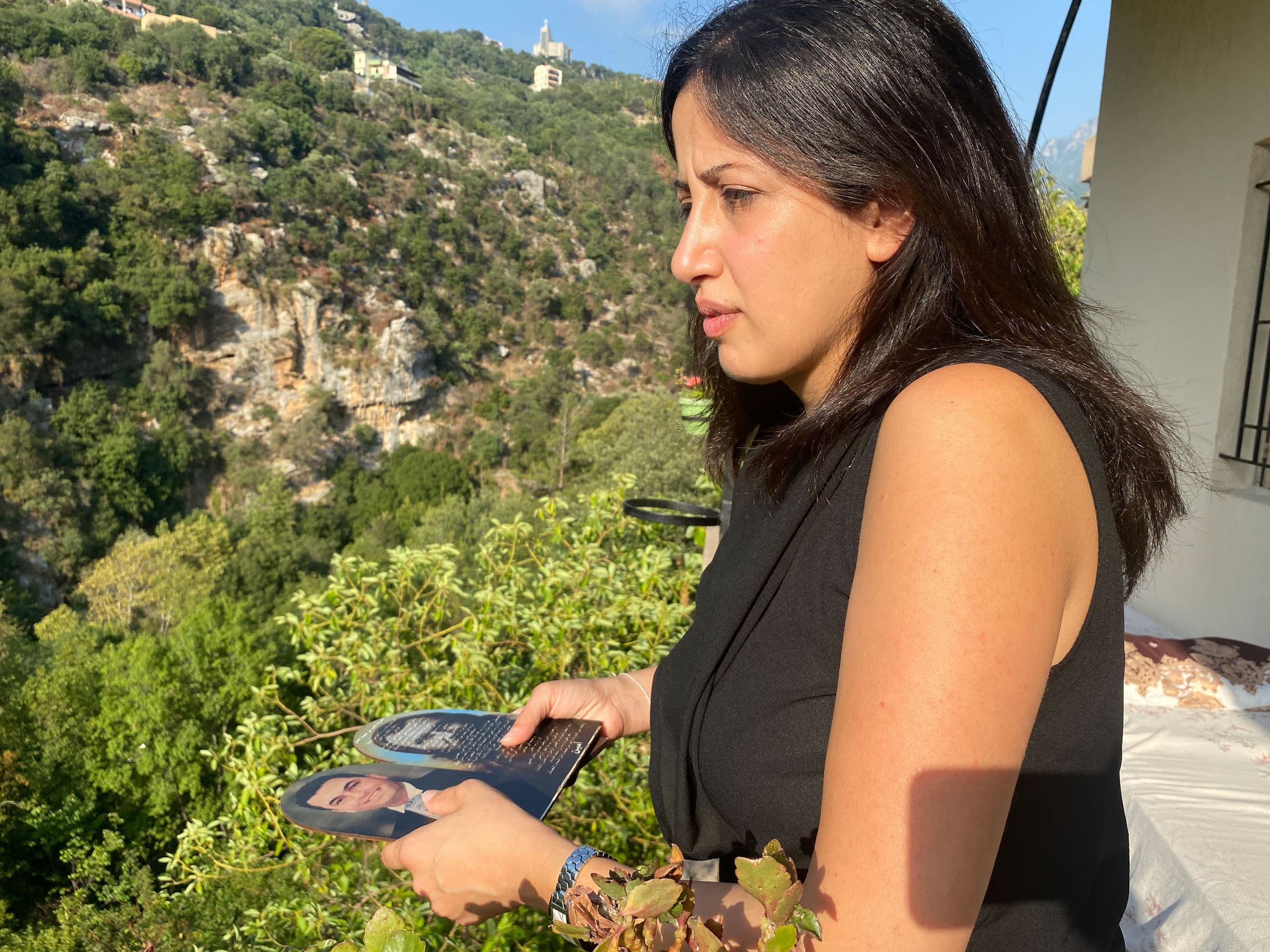 Bernadette Daw Gamayel looks out over the balcony.