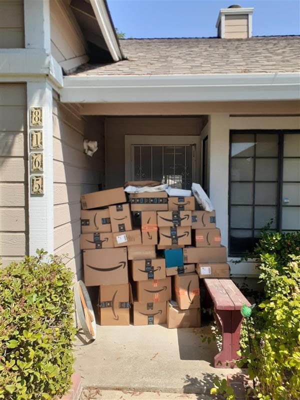 Boxes arrive at the door of a World Relief Sacramento employee. Donations are arriving quickly to the refugee resettlement agency. The boxes are filled with everything from kitchen supplies to bedding, items needed to help furnish newly arrived Afghan ref
