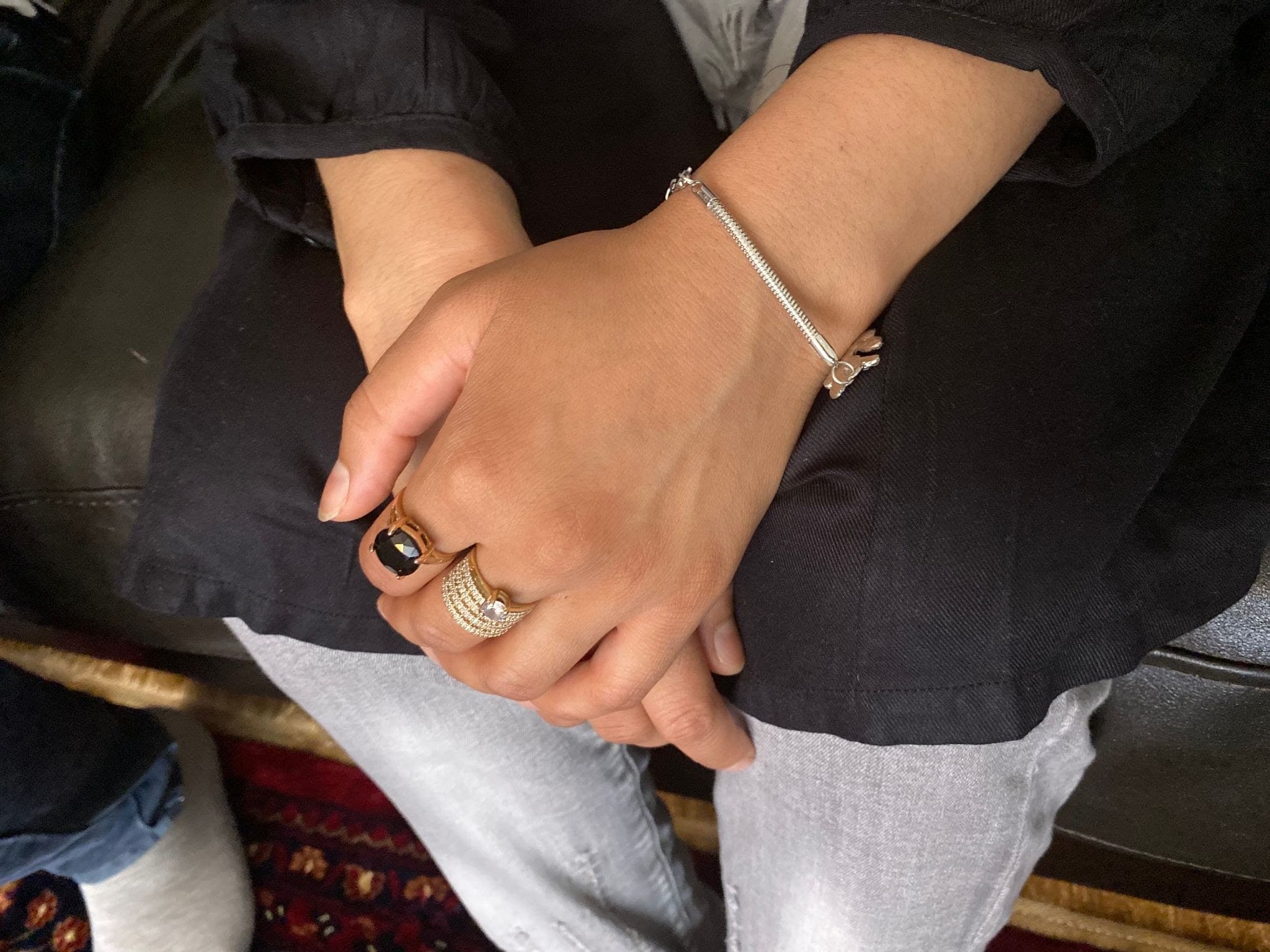 A newly arrived Afghan woman is now safe in the United States, after fleeing Afghanistan. Only her immediate relatives know she has left. Her husband worked with US military forces and she fears Taliban reprisals. 