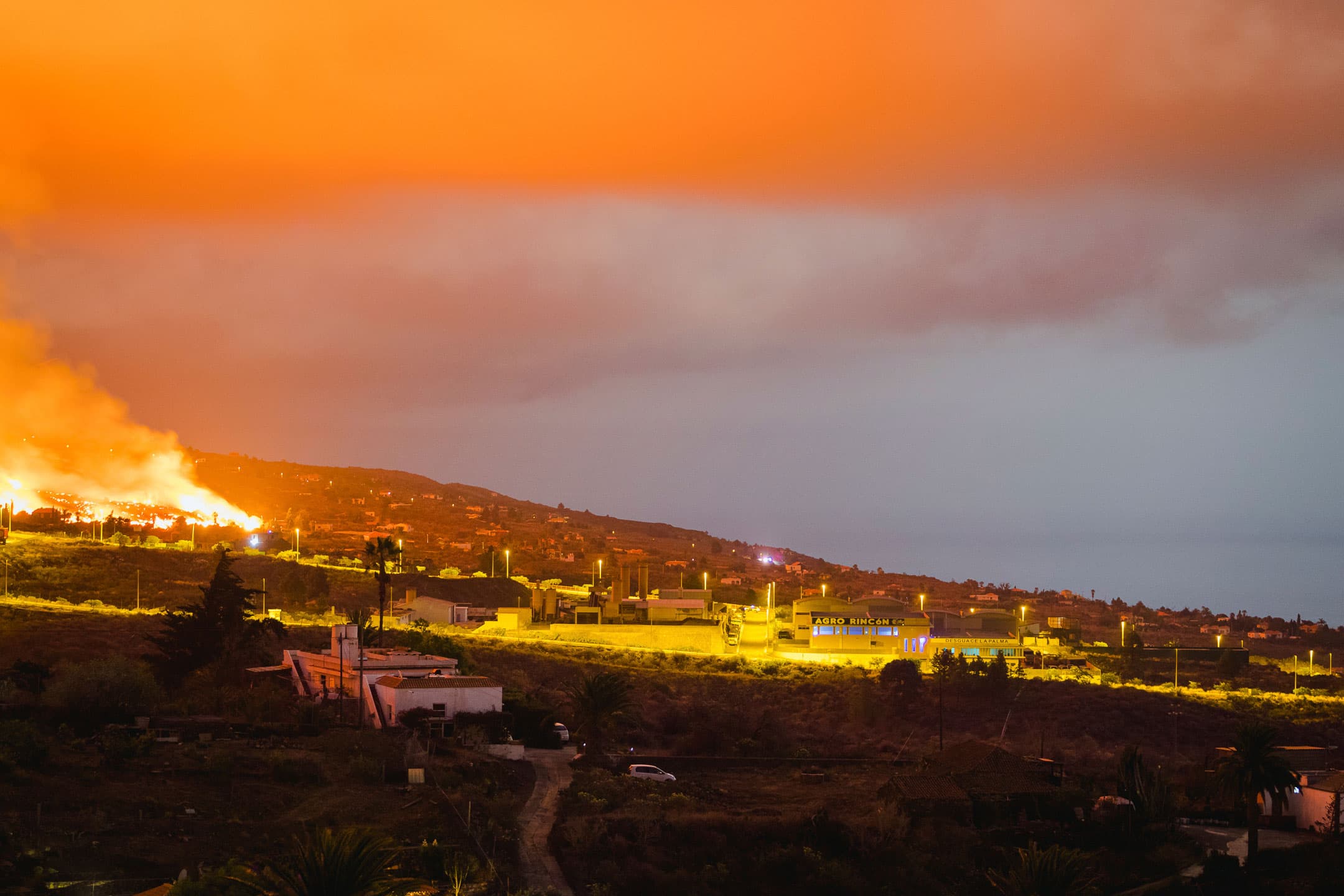 Lava flows from an eruption of a volcano near El Paso on the island of La Palma in the Canaries, Spain, in the early hours of Monday, Sept. 20, 2021.